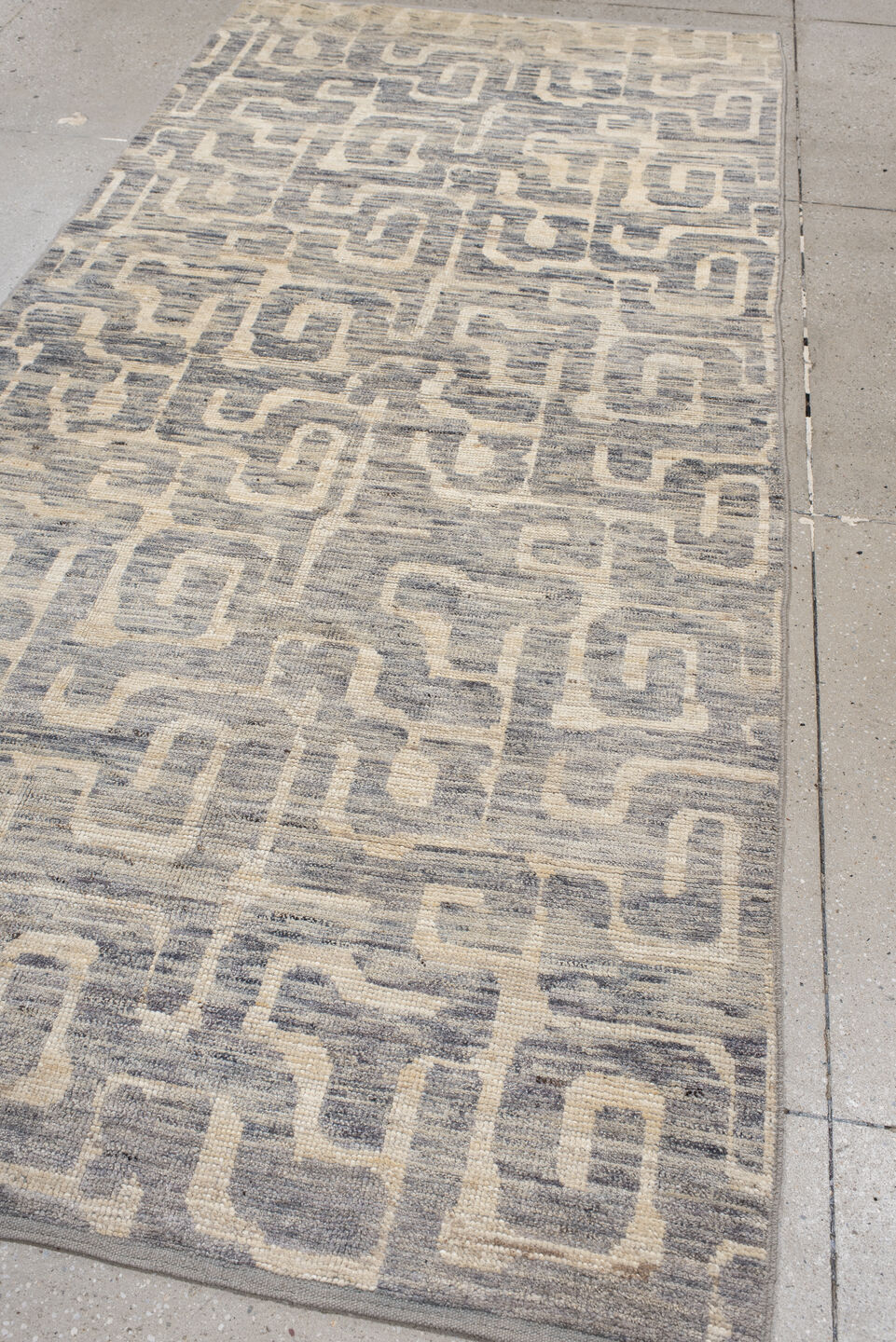 4' x 9' one-of-a-kind handmade vintage Tulu runner rug. Color palette: ivory, gray, slate, cream