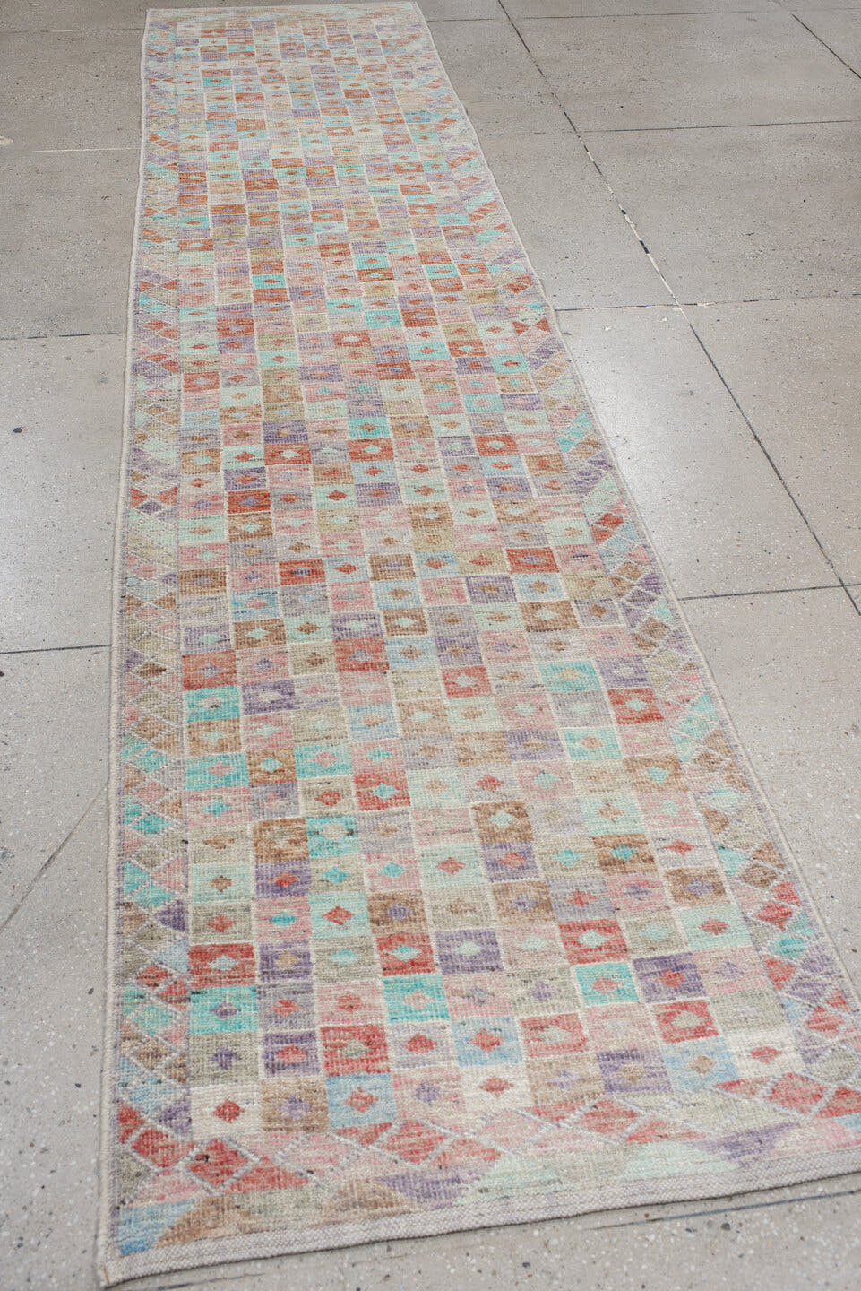 2' x 13' one-of-a-kind handmade vintage Tulu runner rug. Color palette: ivory, aqua, lavender, coral, taupe, sage, teal