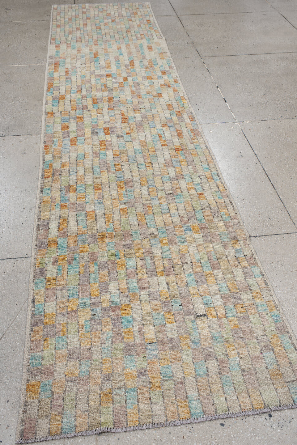 3' x 13' one-of-a-kind handmade vintage Tulu runner rug. Color palette: ivory, taupe, sky_blue, apricot, sage, gray, beige