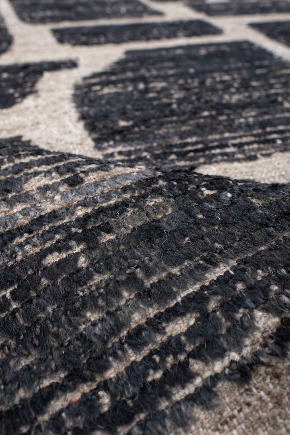 3' x 12' one-of-a-kind handmade vintage Tulu runner rug. Color palette: charcoal, taupe, ivory, gray, black, beige