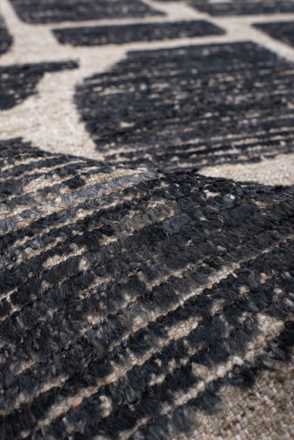 3' x 12' one-of-a-kind handmade vintage Tulu runner rug. Color palette: charcoal, taupe, ivory, gray, black, beige