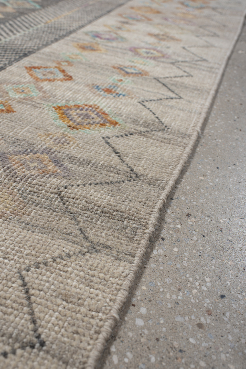 3' x 12' one-of-a-kind handmade vintage Tulu runner rug. Color palette: ivory, taupe, charcoal, camel, pale blue, saffron