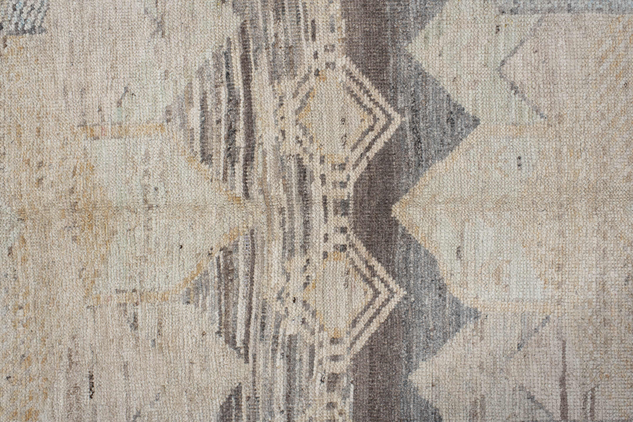 5' x 7' one-of-a-kind handmade vintage Tulu rug. Color palette: brown, gray, light gray, off-white