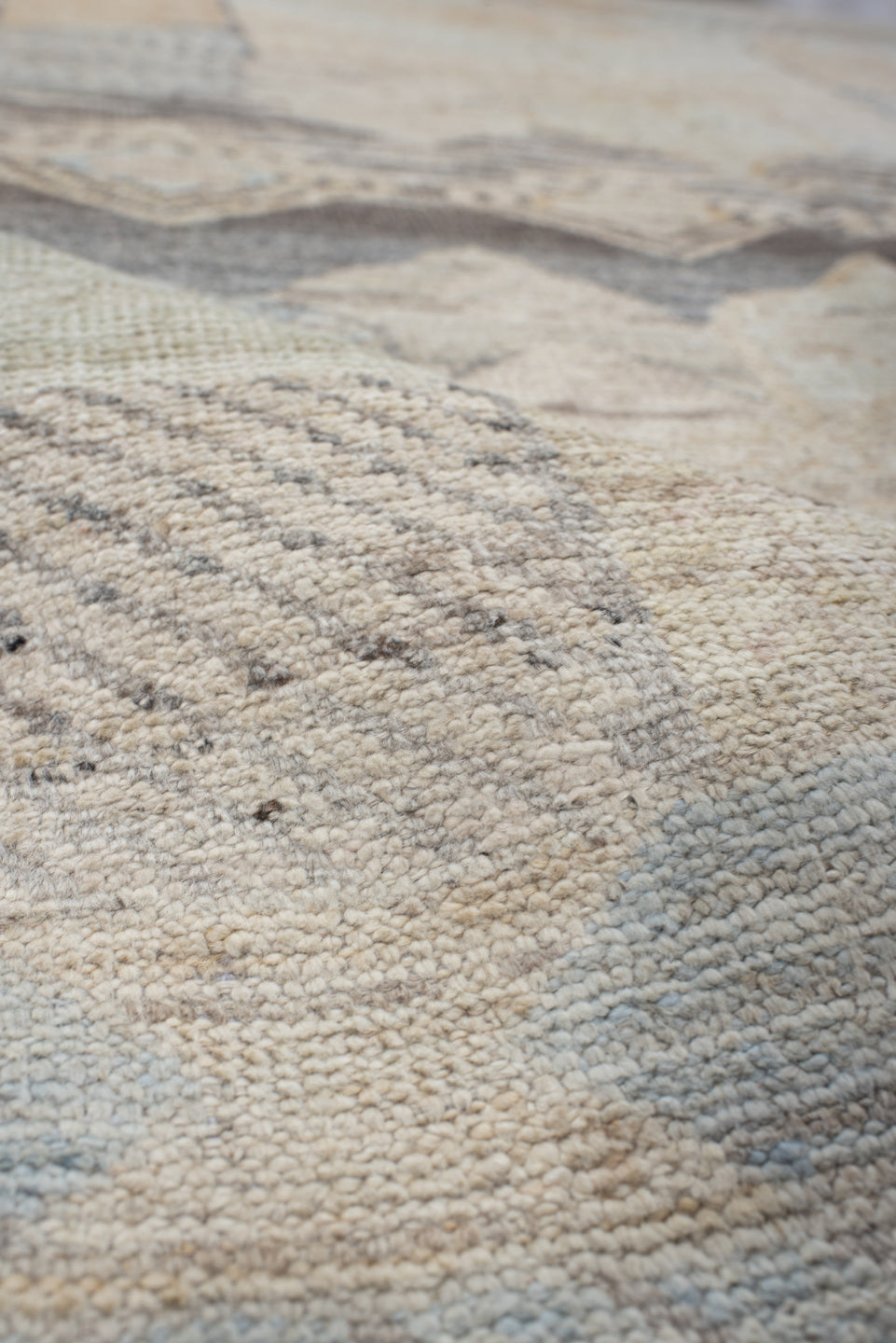 5' x 7' one-of-a-kind handmade vintage Tulu rug. Color palette: ivory, taupe, gray, pale blue, cream, charcoal, sand, beige