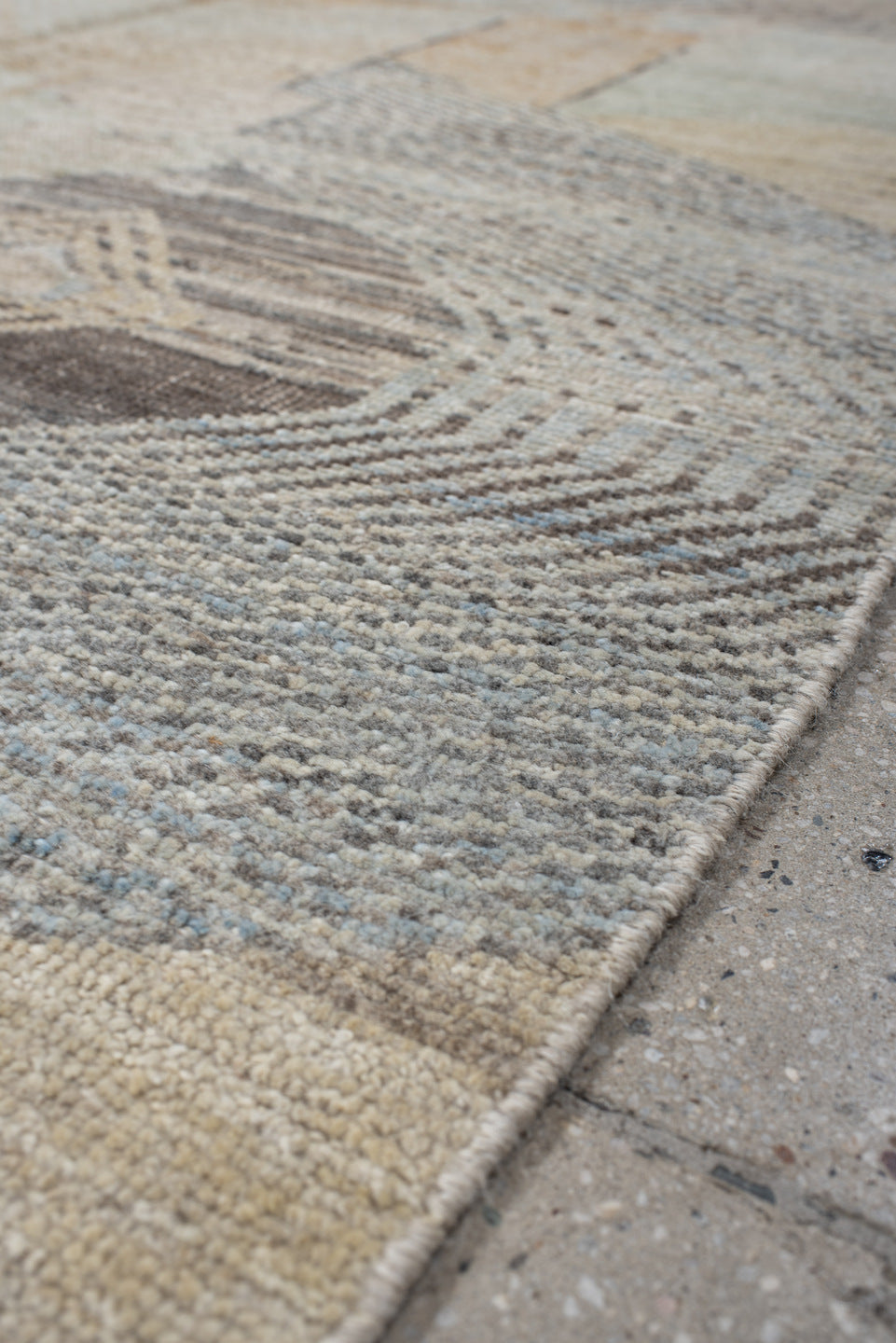 5' x 7' one-of-a-kind handmade vintage Tulu rug. Color palette: ivory, taupe, gray, pale blue, cream, charcoal, sand, beige
