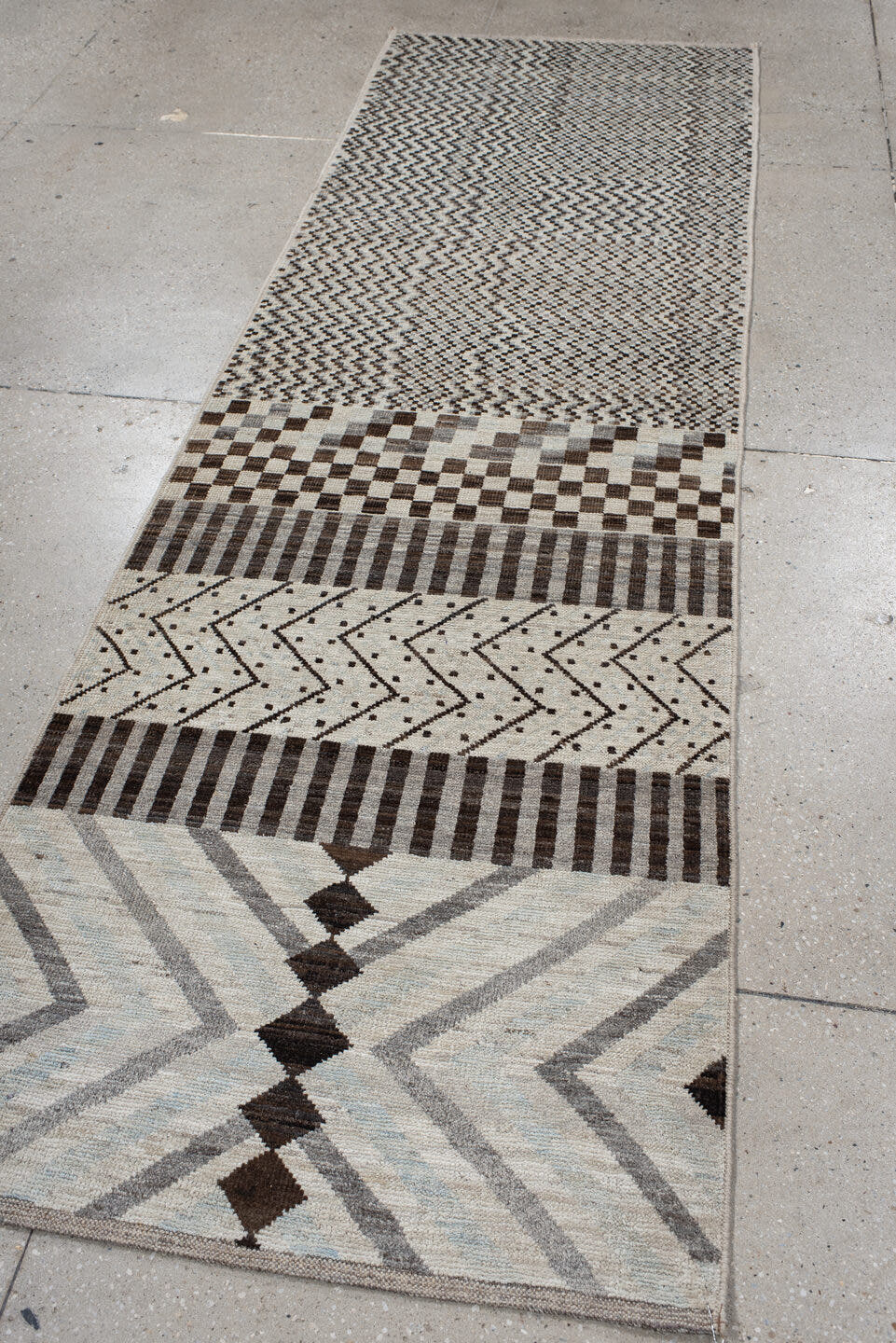 2' x 9' one-of-a-kind handmade vintage Tulu runner rug. Color palette: ivory, brown, gray, charcoal, taupe, black, beige