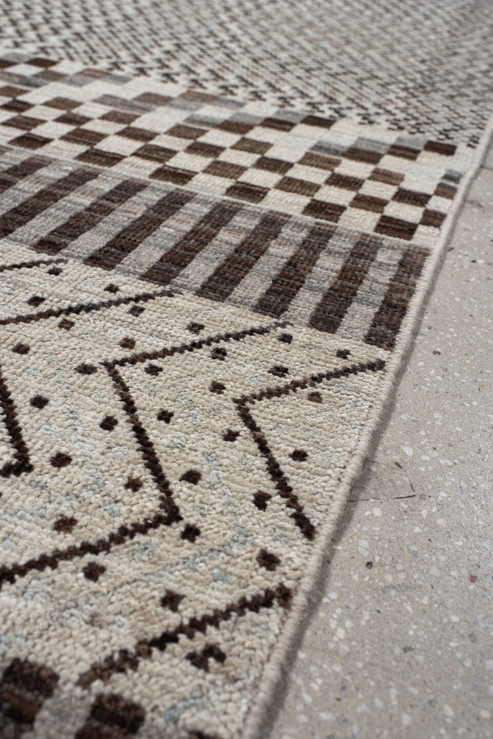 2' x 9' one-of-a-kind handmade vintage Tulu runner rug. Color palette: ivory, brown, gray, charcoal, taupe, black, beige