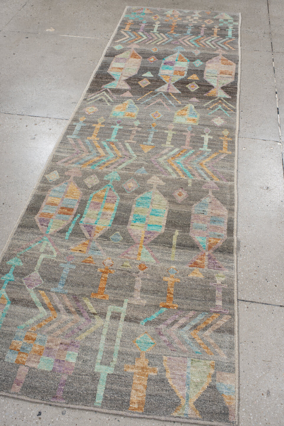 2' x 9' one-of-a-kind handmade vintage Tulu runner rug. Color palette: charcoal, aqua, ivory, lavender, peach, taupe, sage