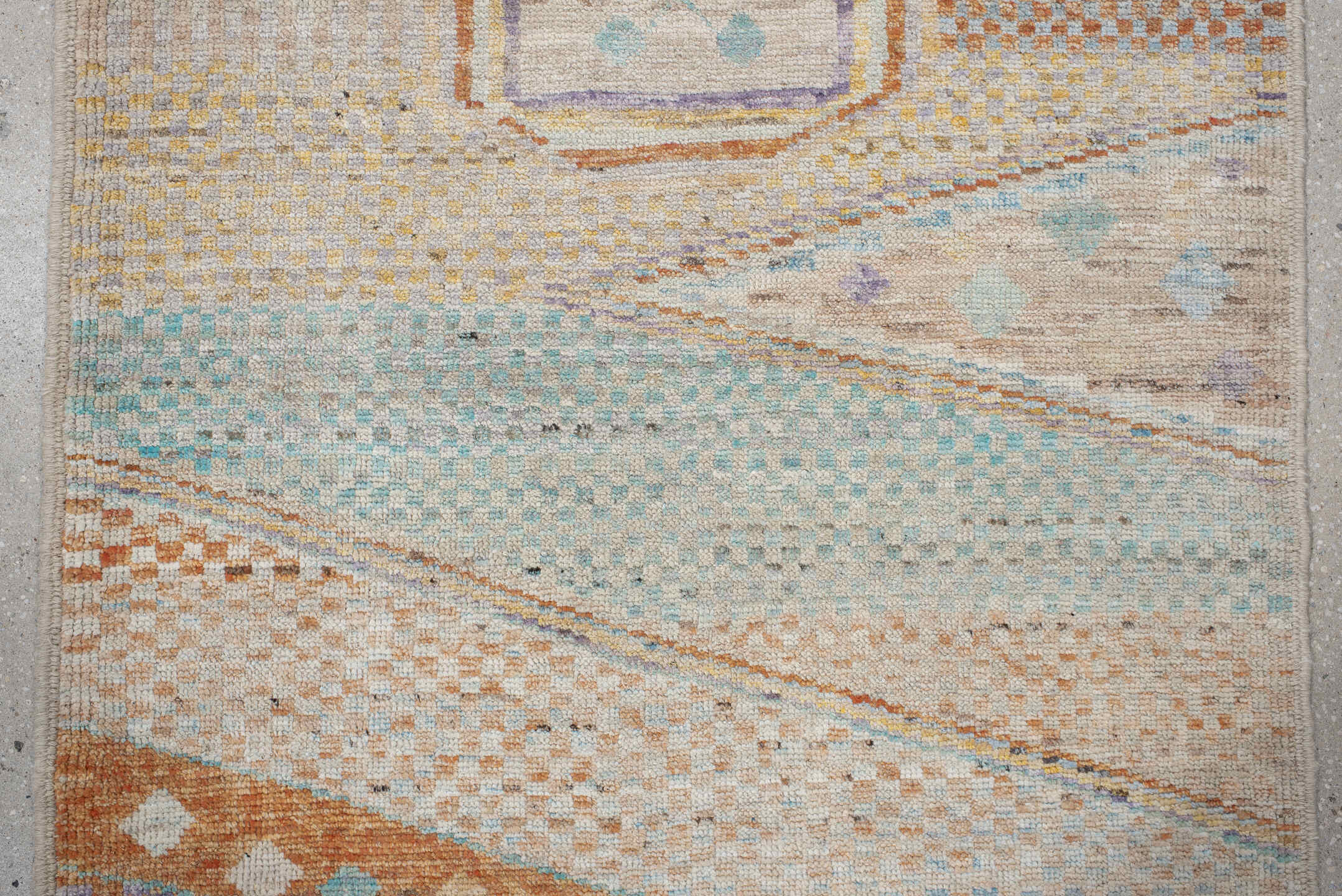 3' x 9' one-of-a-kind handmade vintage Tulu runner rug. Color palette: ivory, aqua, terra cotta, gold, lavender, taupe, teal