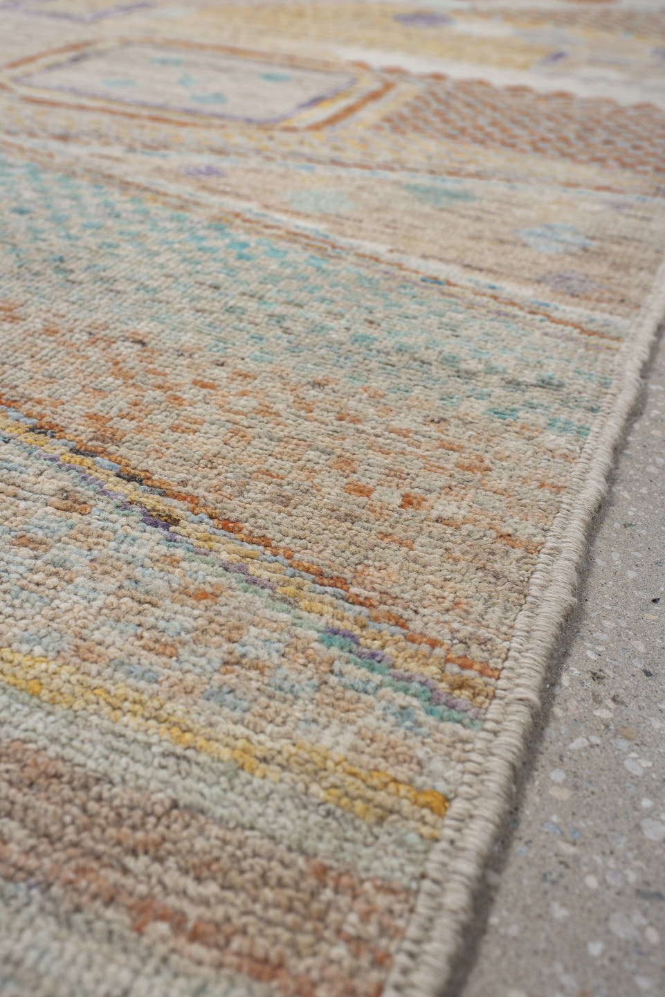 3' x 9' one-of-a-kind handmade vintage Tulu runner rug. Color palette: ivory, aqua, terra cotta, gold, lavender, taupe, teal
