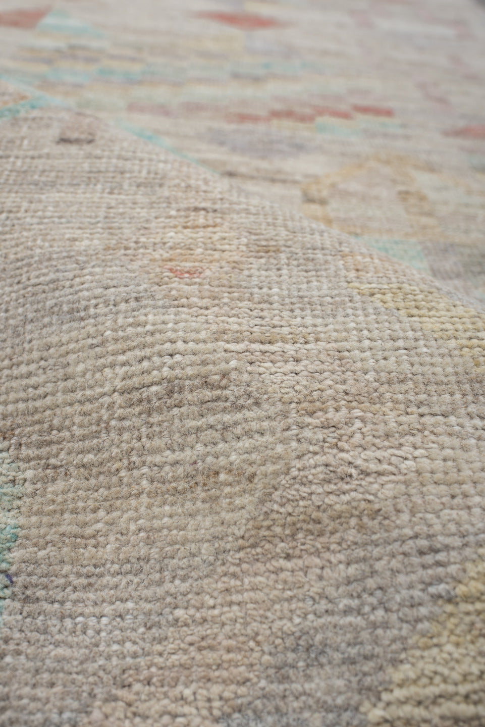 3' x 9' one-of-a-kind handmade vintage Tulu runner rug. Color palette: off-white, gray, light gray, pink, brown, silver