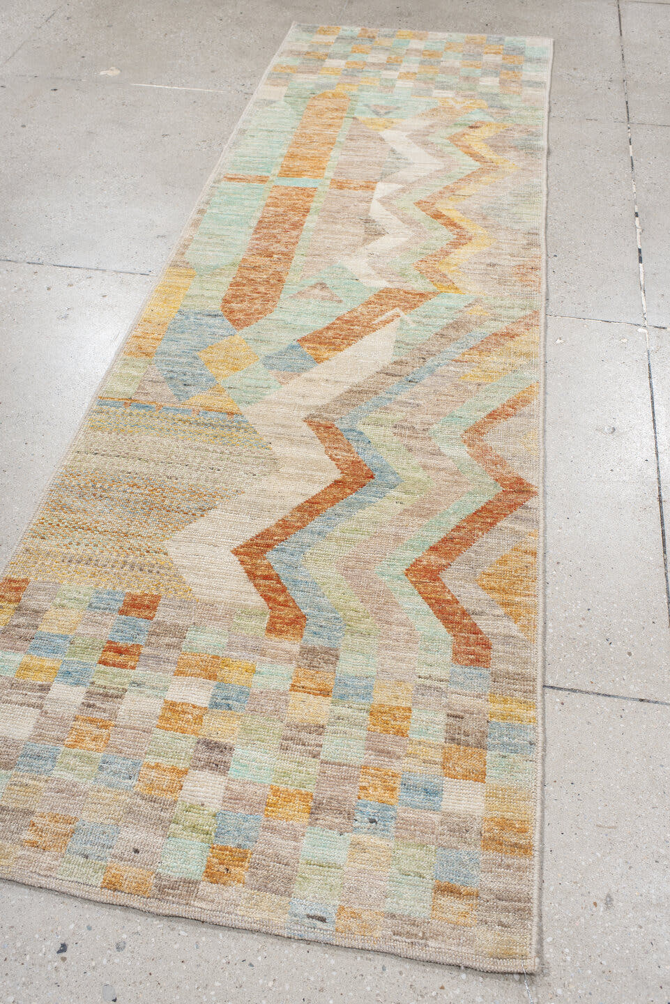 2' x 9' one-of-a-kind handmade vintage Tulu runner rug. Color palette: taupe, ivory, sage, terra cotta, pale blue, gold