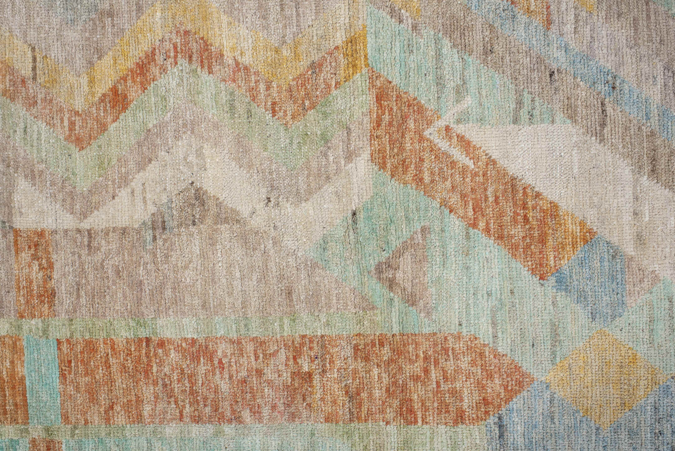 2' x 9' one-of-a-kind handmade vintage Tulu runner rug. Color palette: brown, gray, light gray, off-white, orange, pink