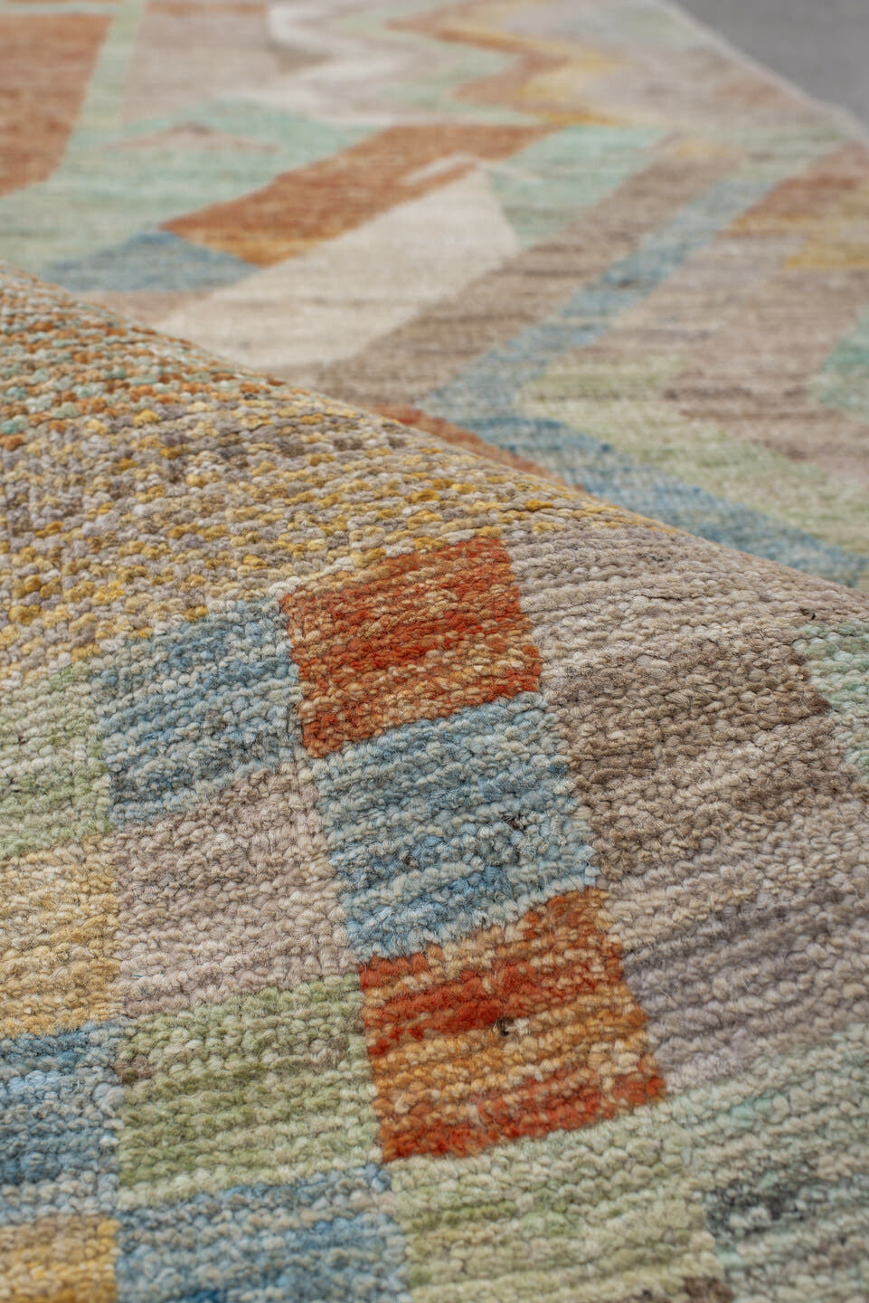 2' x 9' one-of-a-kind handmade vintage Tulu runner rug. Color palette: taupe, ivory, sage, terra cotta, pale blue, gold