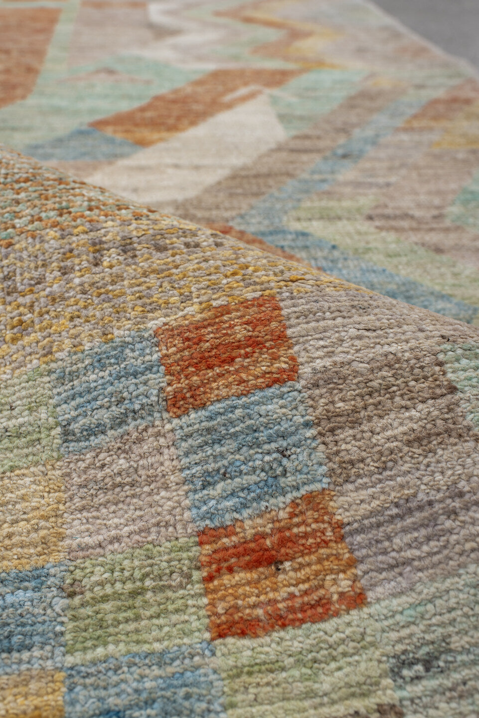 2' x 9' one-of-a-kind handmade vintage Tulu runner rug. Color palette: taupe, ivory, sage, terra cotta, pale blue, gold