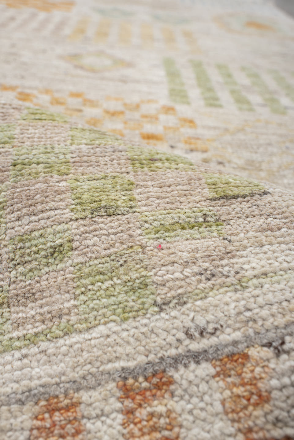 2' x 9' one-of-a-kind handmade vintage Tulu runner rug. Color palette: ivory, beige, sage, pale blue, soft gold, apricot
