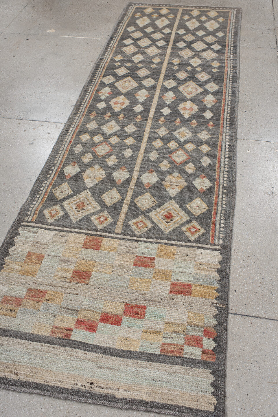 2' x 9' one-of-a-kind handmade vintage Tulu runner rug. Color palette: charcoal, ivory, camel, rust, cream, taupe, gray