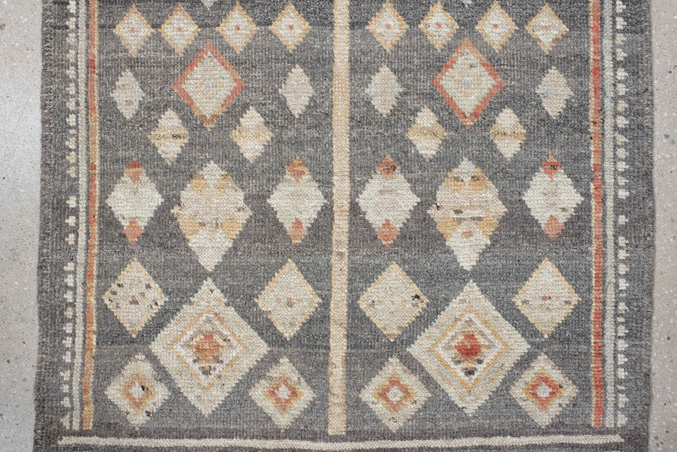 2' x 9' one-of-a-kind handmade vintage Tulu runner rug. Color palette: charcoal, ivory, camel, rust, cream, taupe, gray