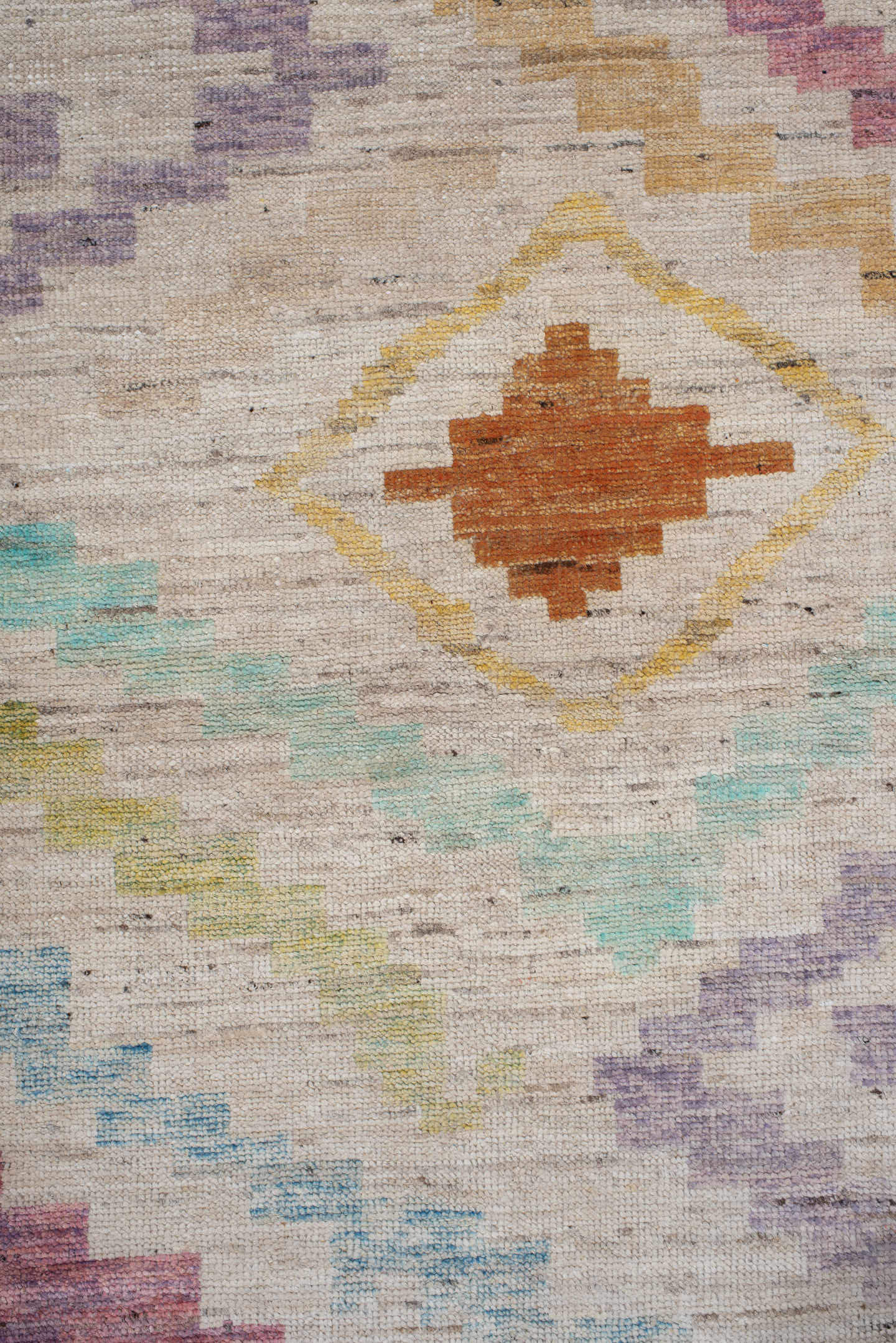 3' x 9' one-of-a-kind handmade vintage Tulu runner rug. Color palette: ivory, lavender, aqua, rust, gold, sage, rose, peach