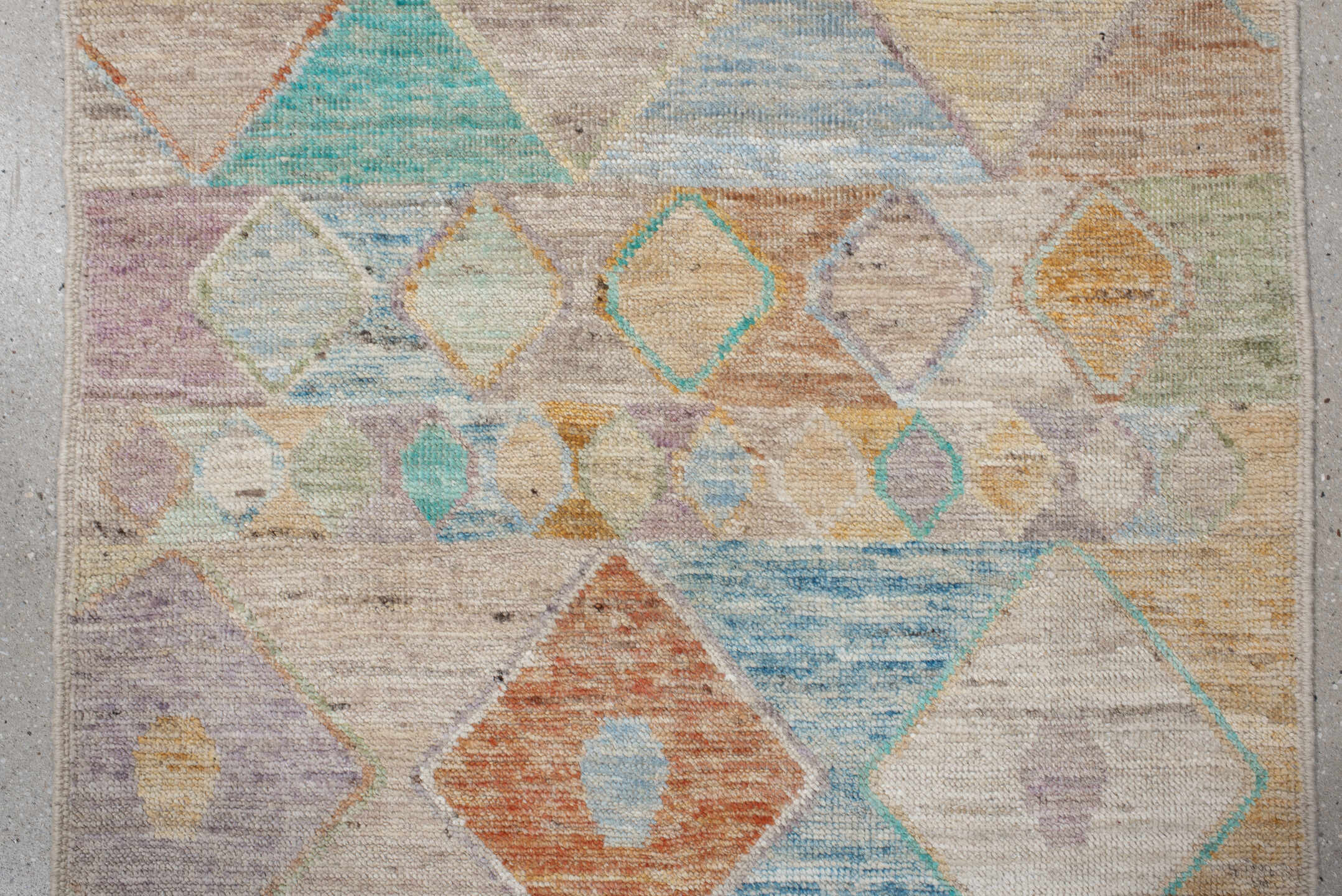 3' x 9' one-of-a-kind handmade vintage Tulu runner rug. Color palette: off-white, orange, brown, light gray, gray, blue