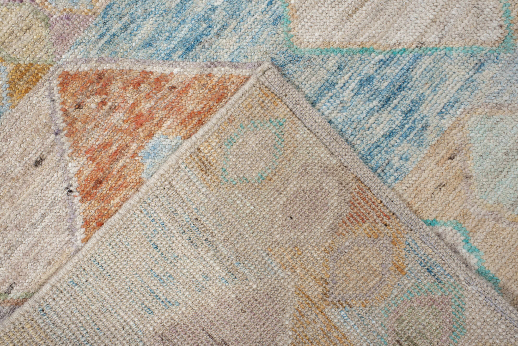 3' x 9' one-of-a-kind handmade vintage Tulu runner rug. Color palette: blue, brown, gray, green, light gray, off-white