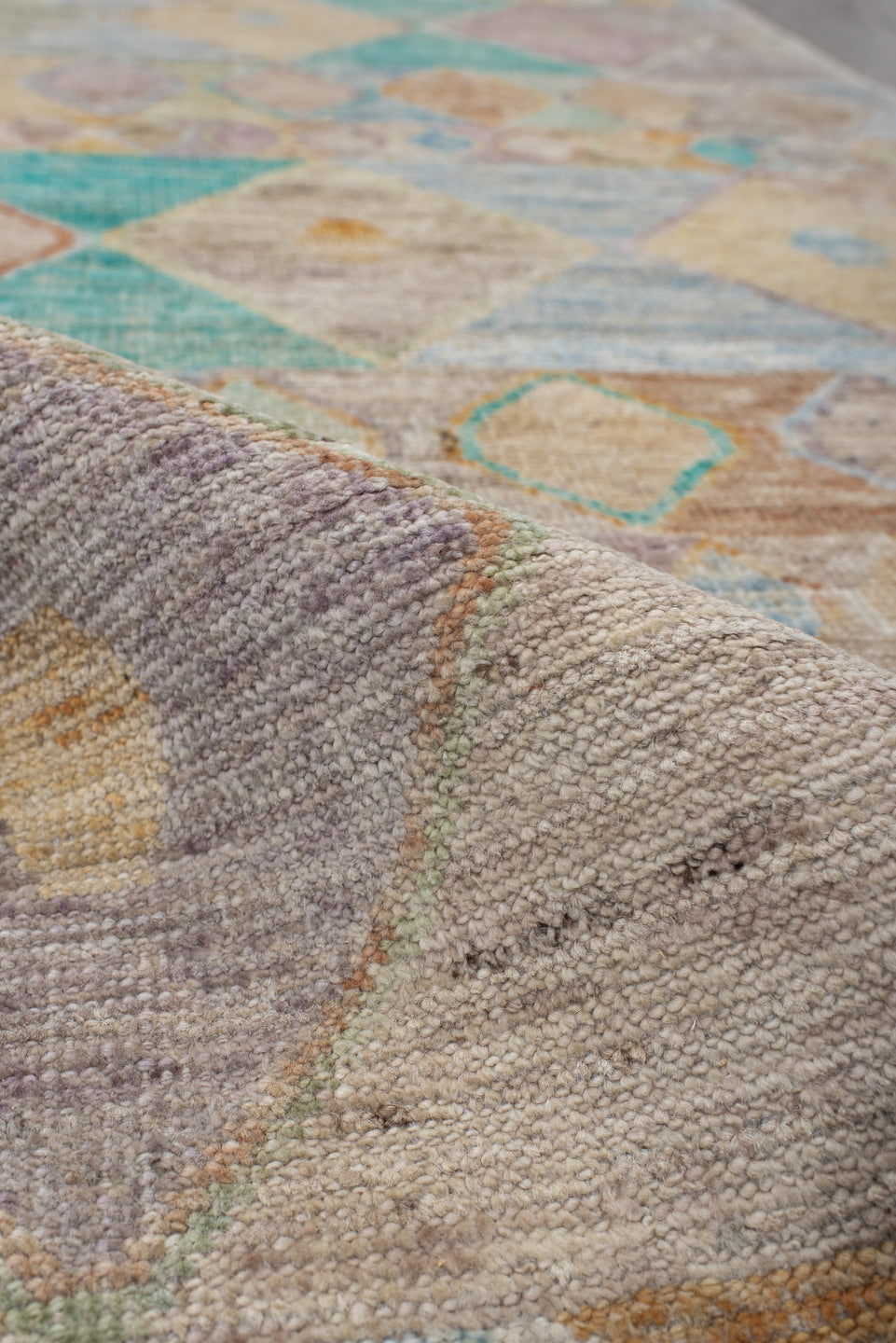 3' x 9' one-of-a-kind handmade vintage Tulu runner rug. Color palette: ivory, beige, aqua, sky_blue, taupe, lavender, peach