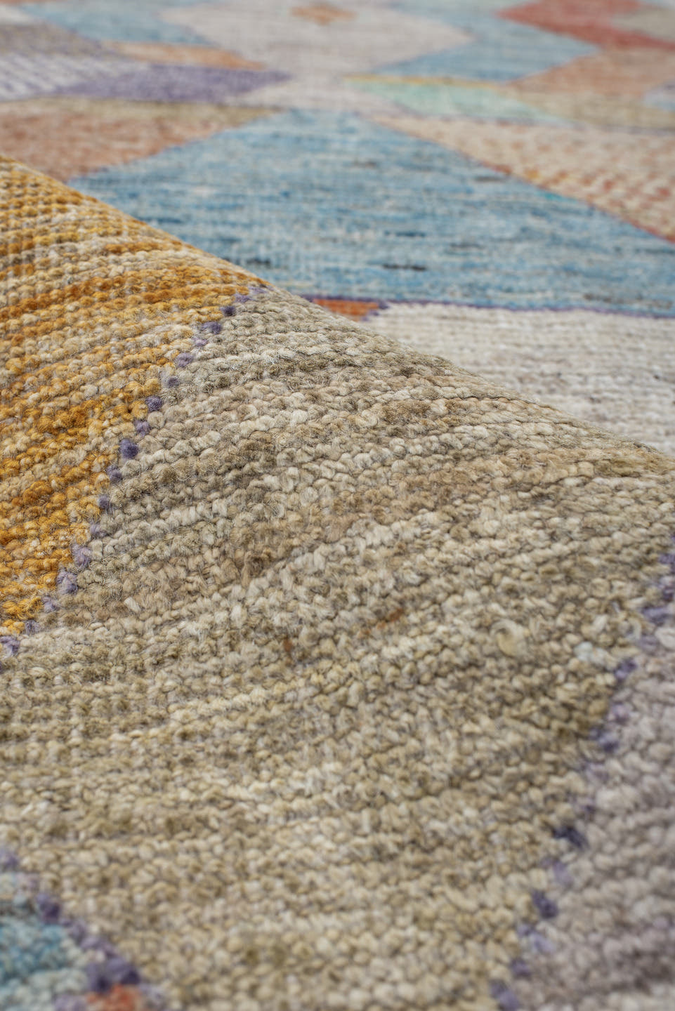 2' x 12' one-of-a-kind handmade vintage Tulu runner rug. Color palette: ivory, aqua, lavender, rust, gold, taupe, sky_blue