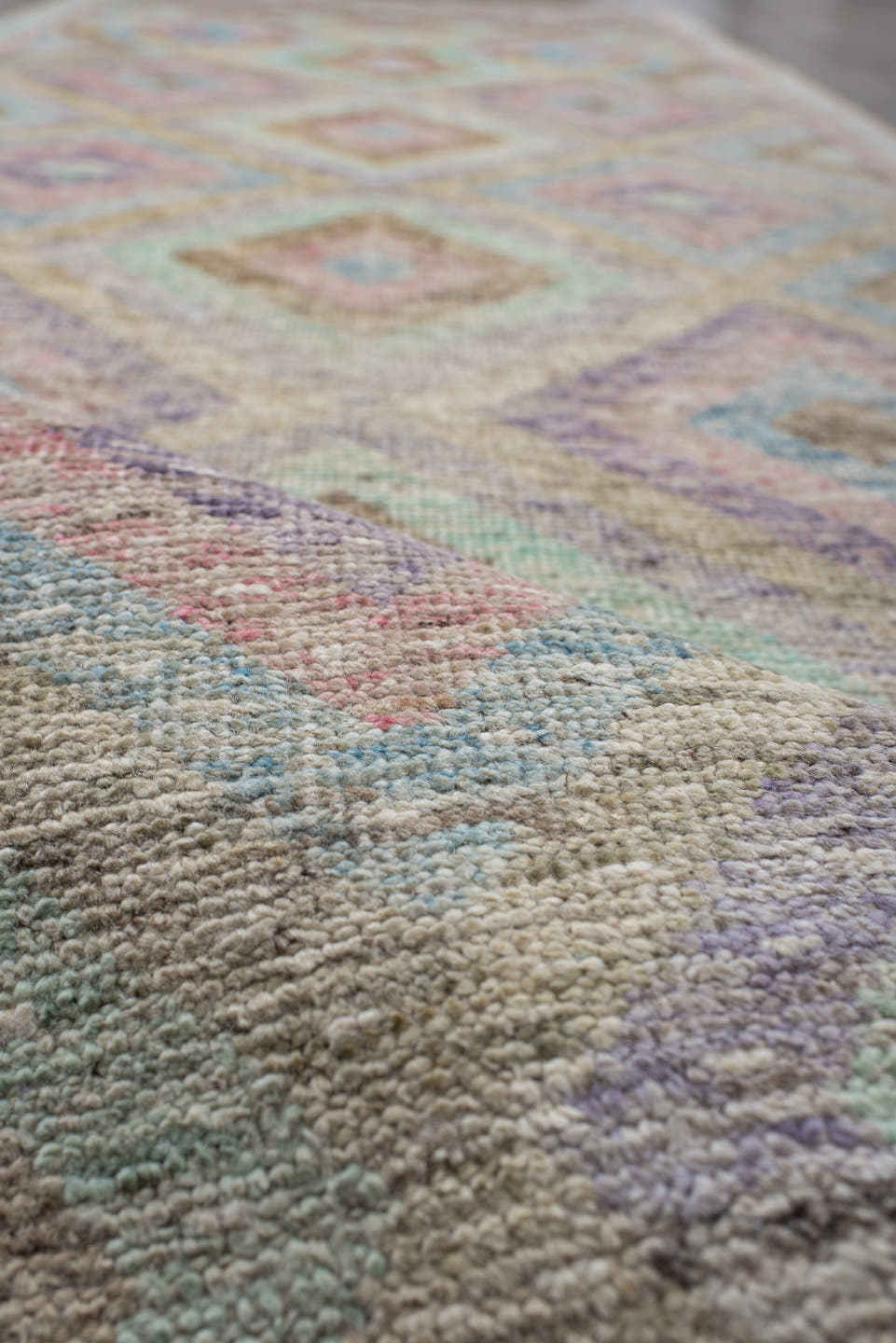 3' x 9' one-of-a-kind handmade vintage Tulu runner rug. Color palette: ivory, aqua, tan, blush, lavender, sage, gold, teal