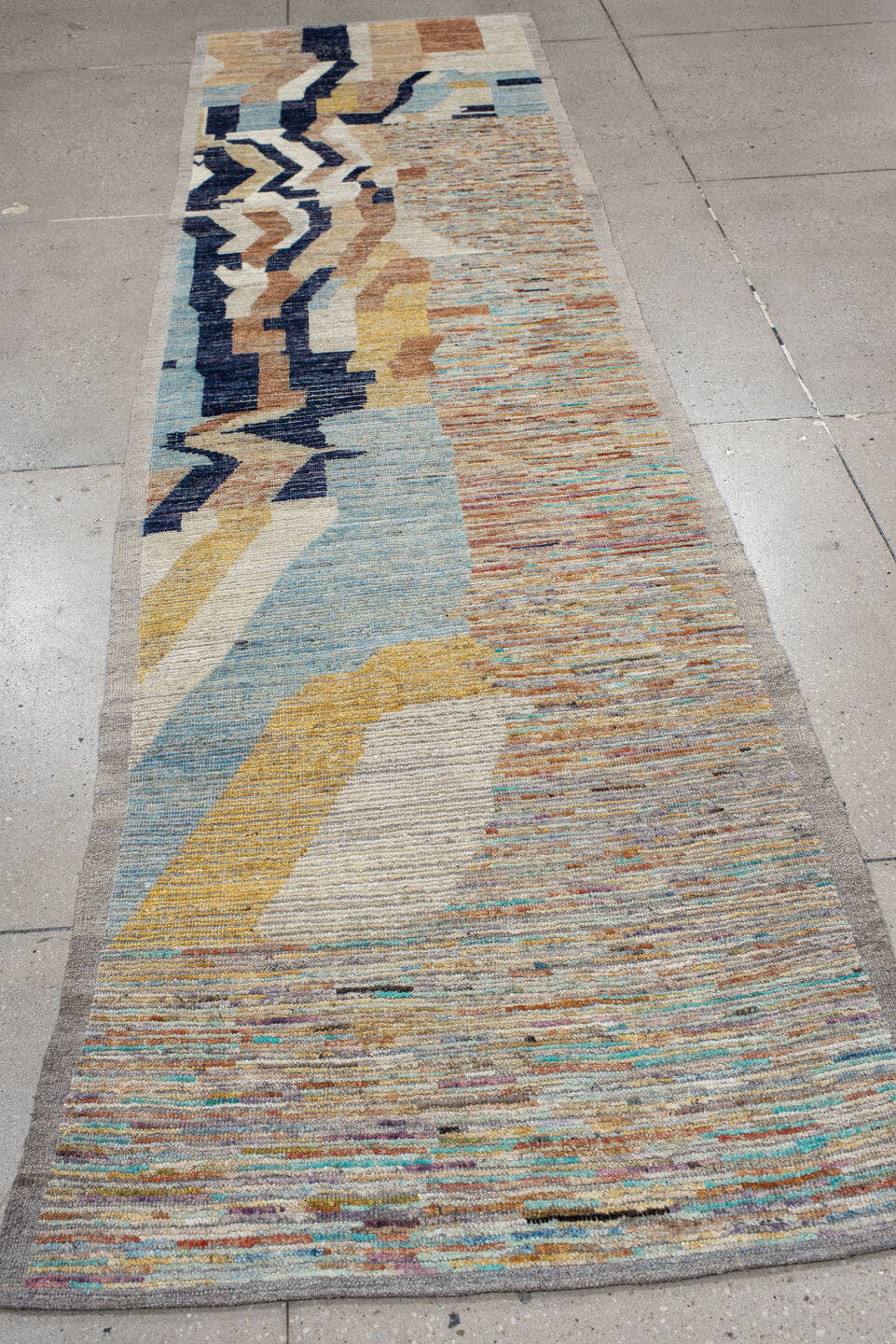 3' x 11' one-of-a-kind handmade vintage Tulu runner rug. Color palette: ivory, sky blue, navy, camel, rust, gold, taupe