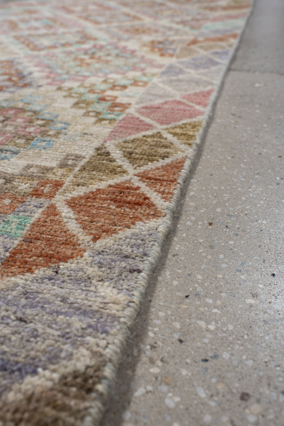 2' x 12' one-of-a-kind handmade vintage Tulu runner rug. Color palette: ivory, taupe, aqua, rust, lavender, rose, sage, sand