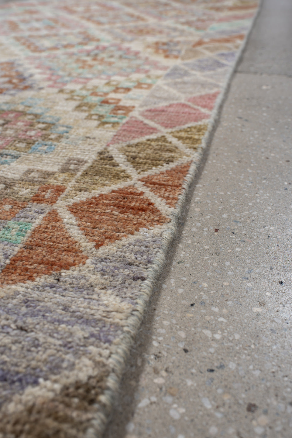 2' x 12' one-of-a-kind handmade vintage Tulu runner rug. Color palette: ivory, taupe, aqua, rust, lavender, rose, sage, sand