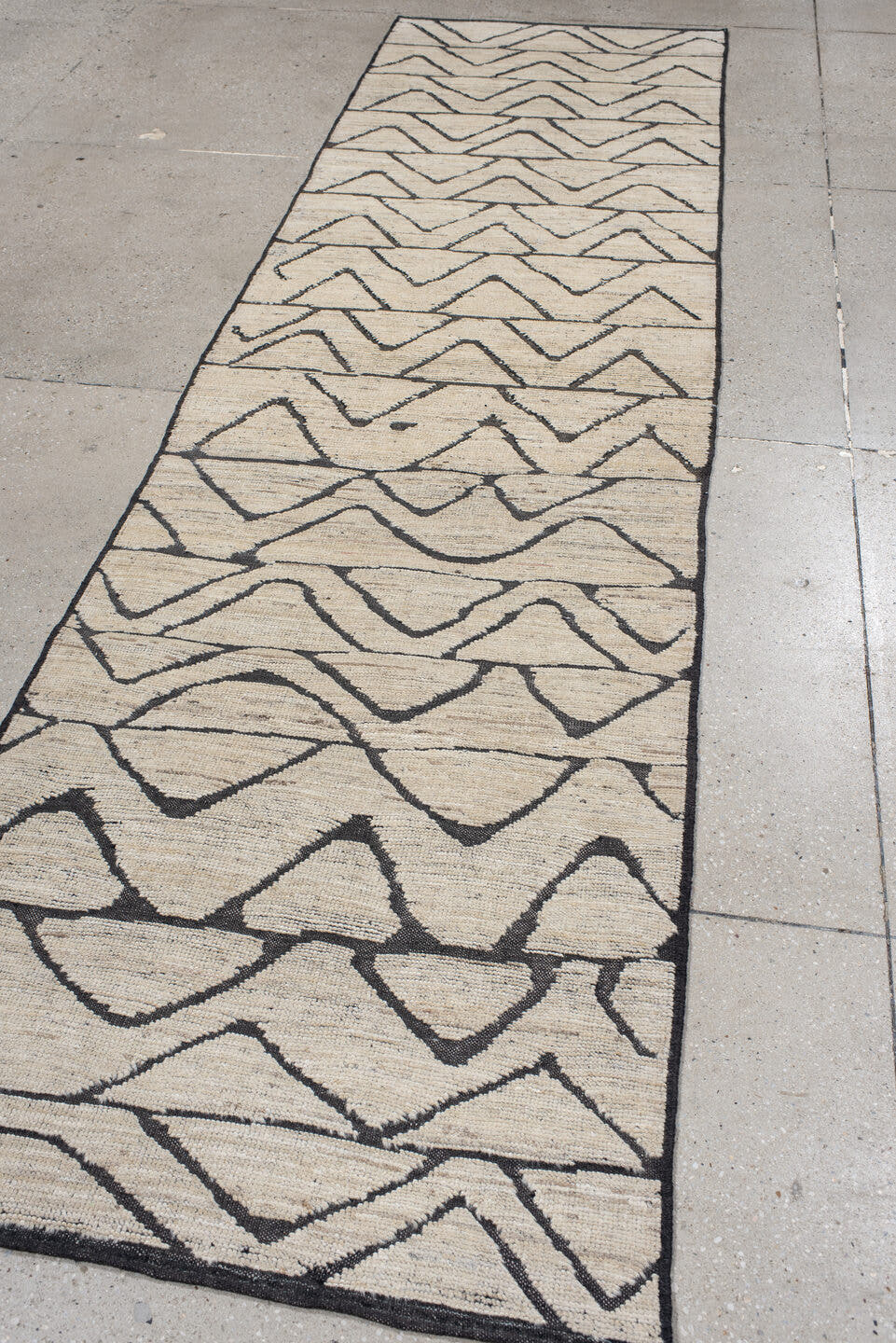 2' x 10' one-of-a-kind handmade vintage Tulu runner rug. Color palette: ivory, charcoal, taupe, gray, black, beige