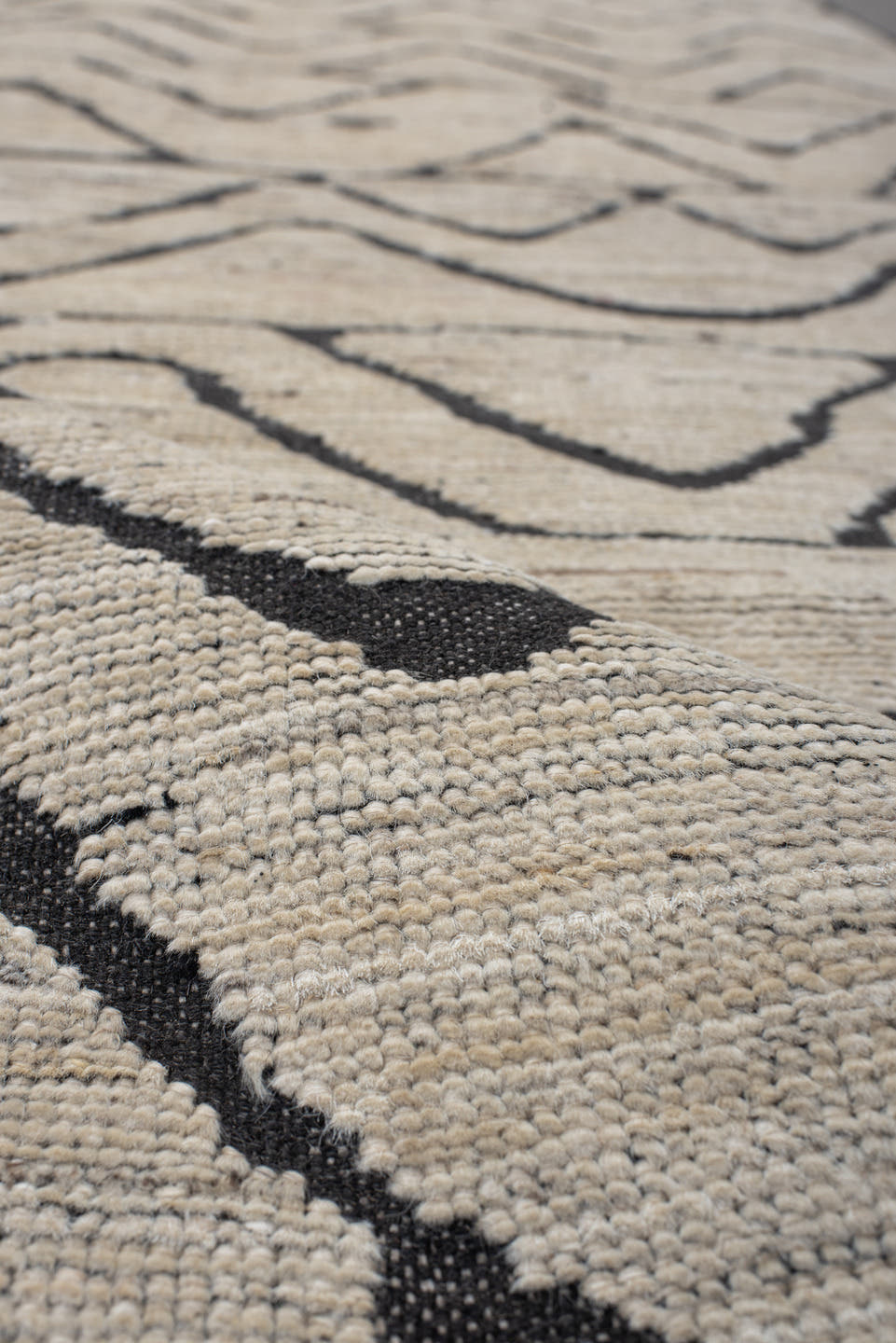 2' x 10' one-of-a-kind handmade vintage Tulu runner rug. Color palette: ivory, charcoal, taupe, gray, black, beige