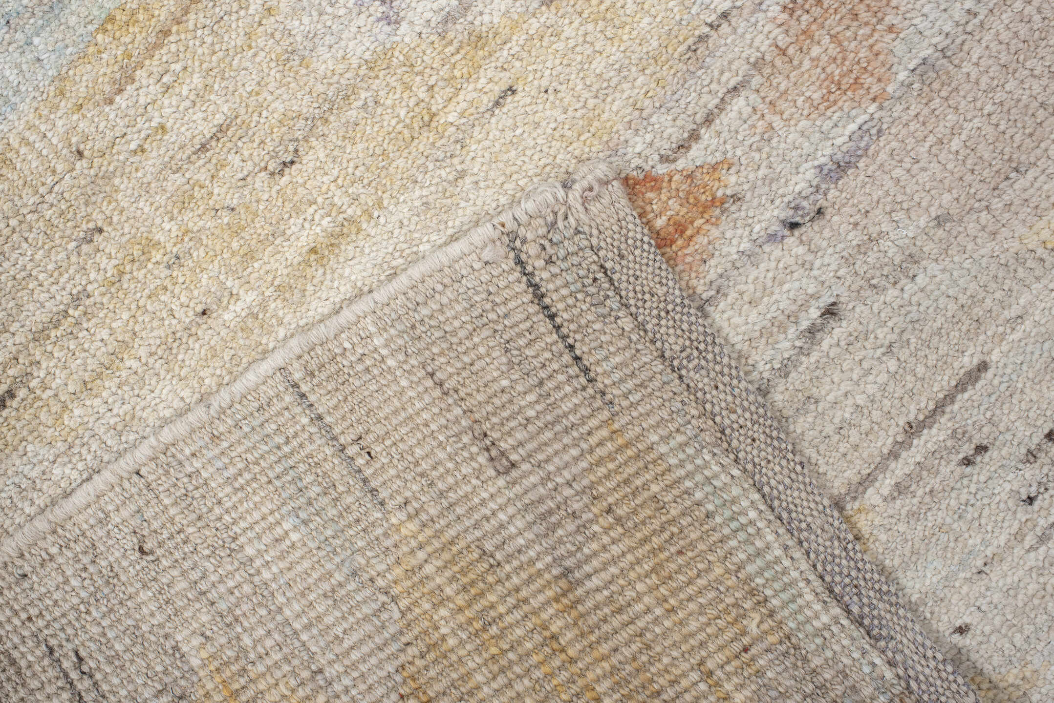 2' x 10' one-of-a-kind handmade vintage Tulu runner rug. Color palette: ivory, lavender, aqua, pale yellow, coral, beige