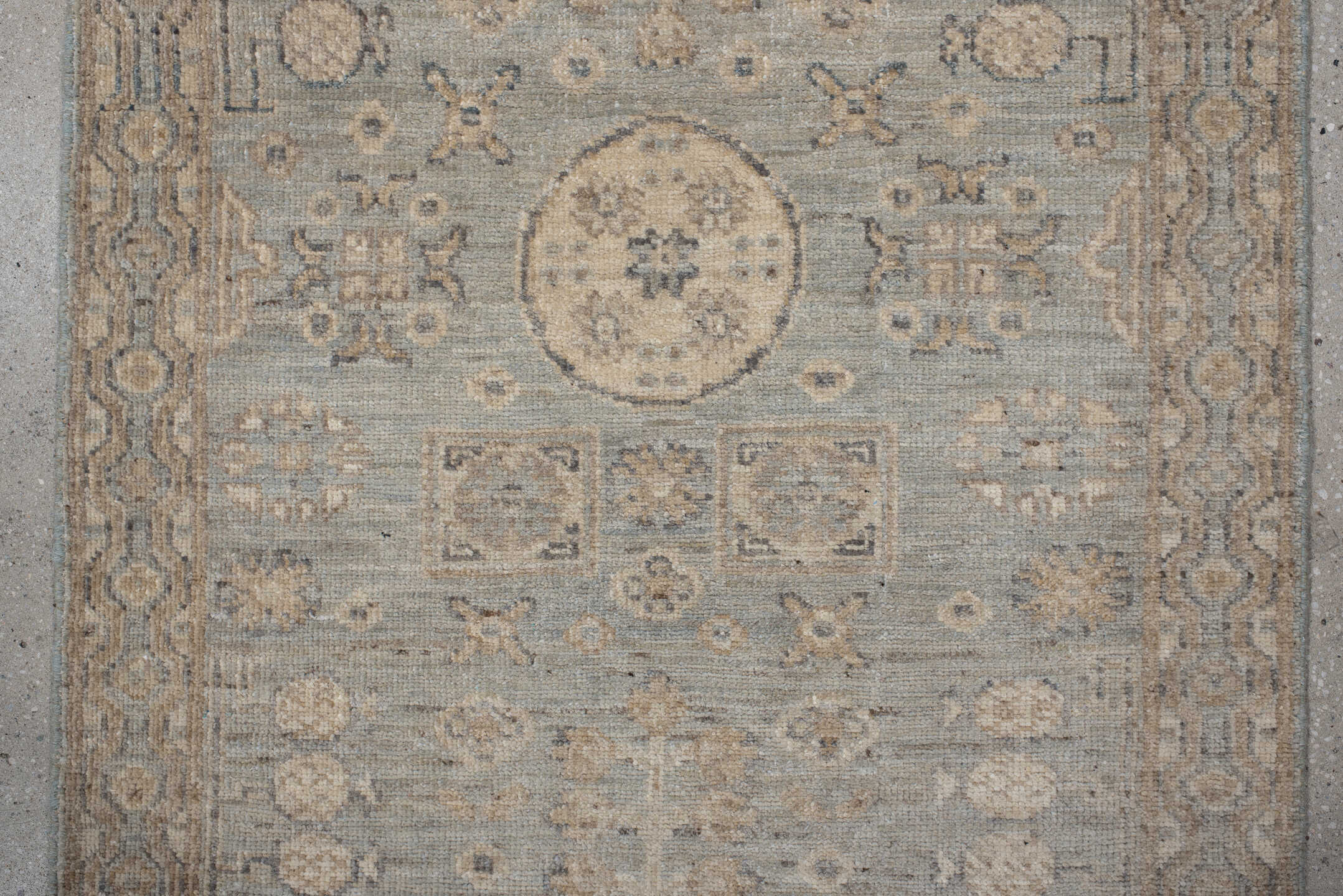 2' x 9' one-of-a-kind handmade vintage Khotan runner rug. Color palette: pale blue, ivory, taupe, beige, camel, slate