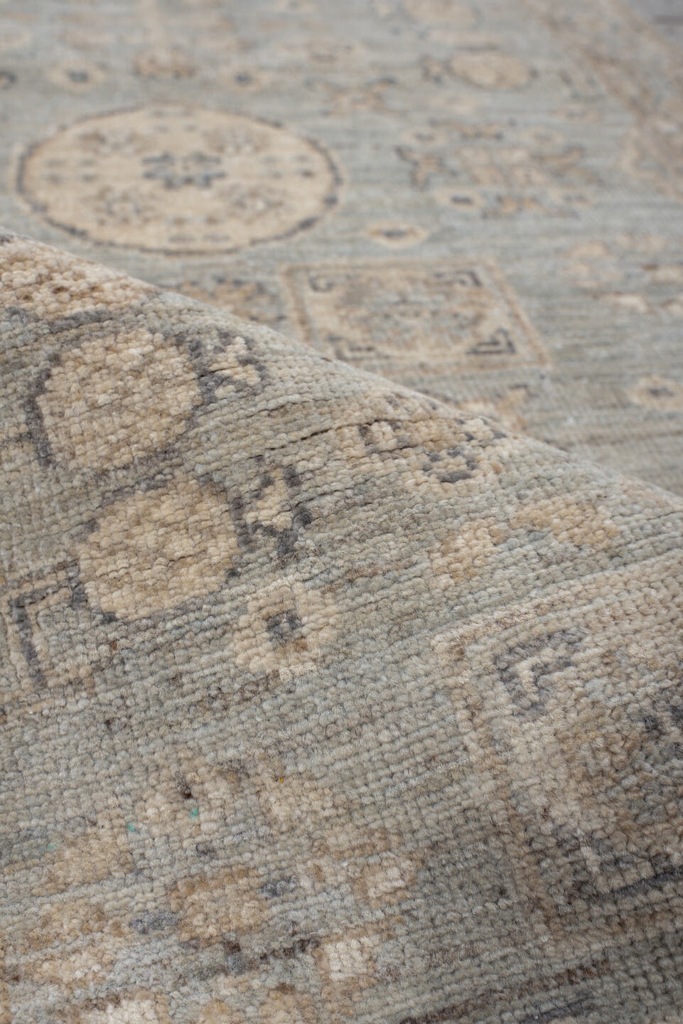 2' x 9' one-of-a-kind handmade vintage Khotan runner rug. Color palette: pale blue, ivory, taupe, beige, camel, slate
