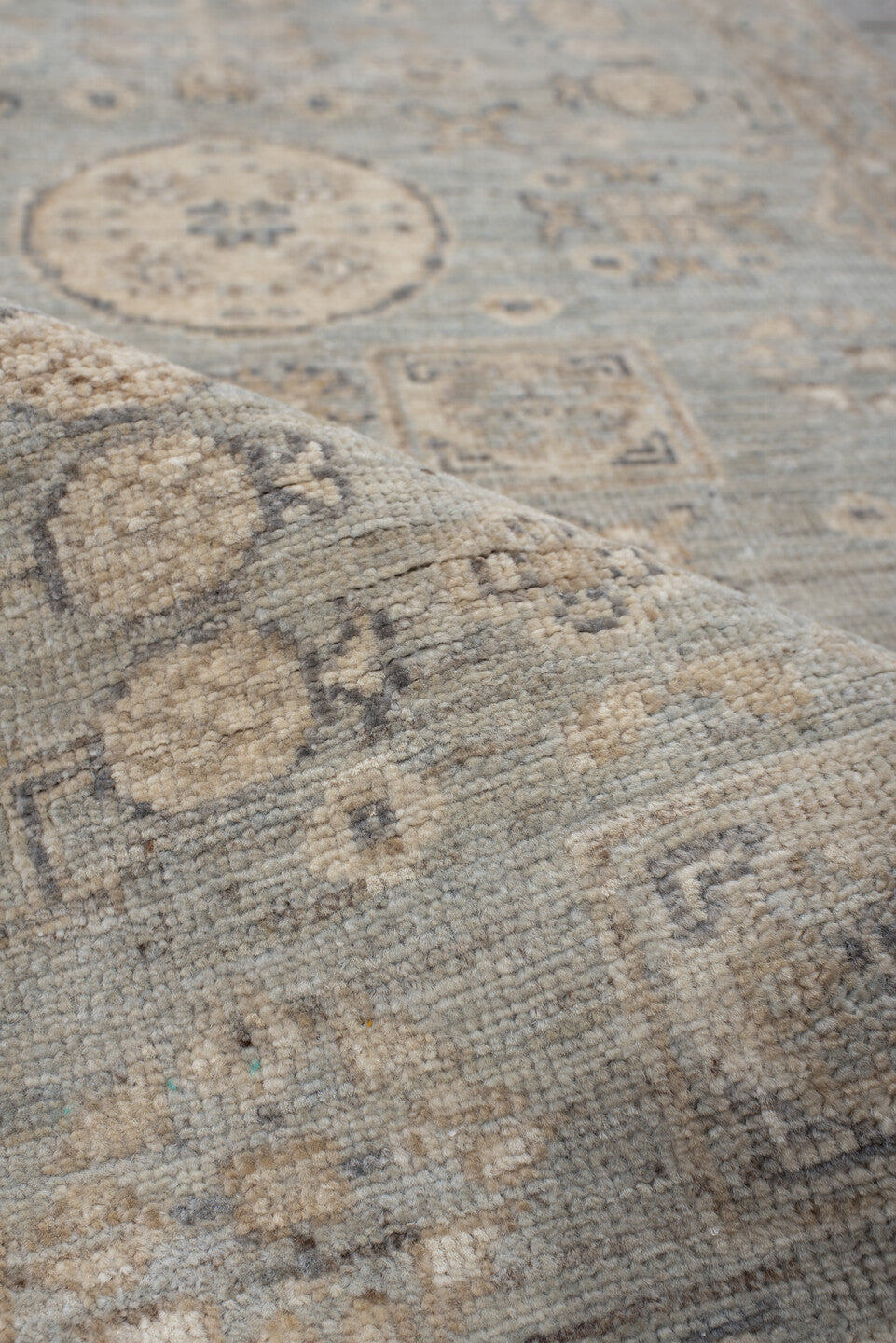 2' x 9' one-of-a-kind handmade vintage Khotan runner rug. Color palette: pale blue, ivory, taupe, beige, camel, slate