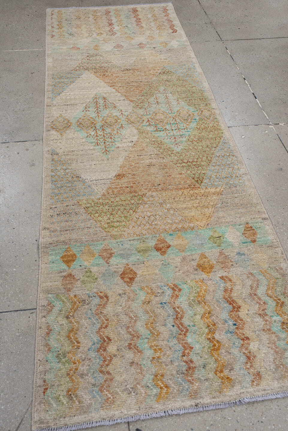 3' x 9' one-of-a-kind handmade vintage Kilim runner rug. Color palette: ivory, beige, pale aqua, peach, sand, soft gold