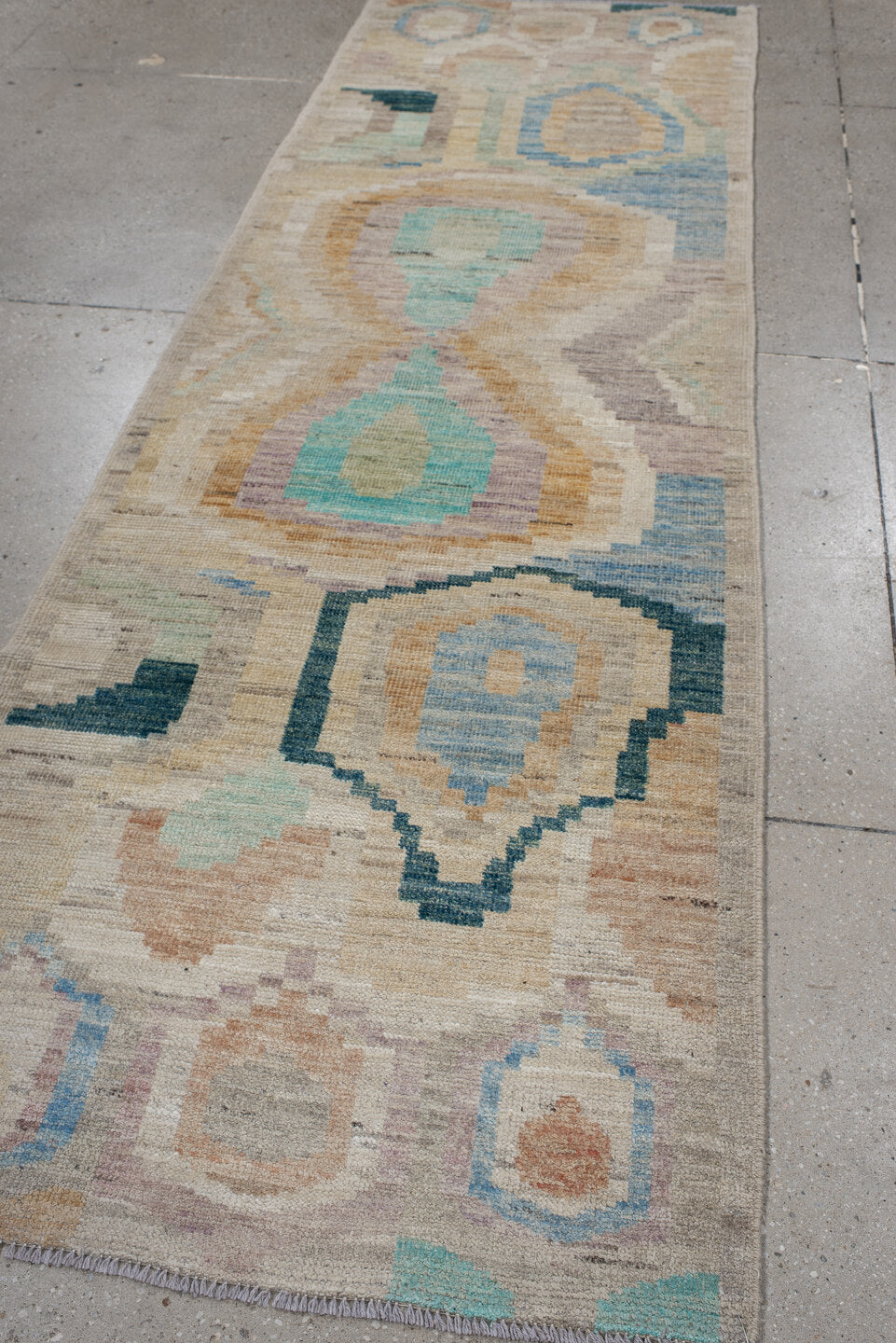 3' x 9' one-of-a-kind handmade vintage Kilim runner rug. Color palette: ivory, beige, sky_blue, aqua, peach, teal, taupe