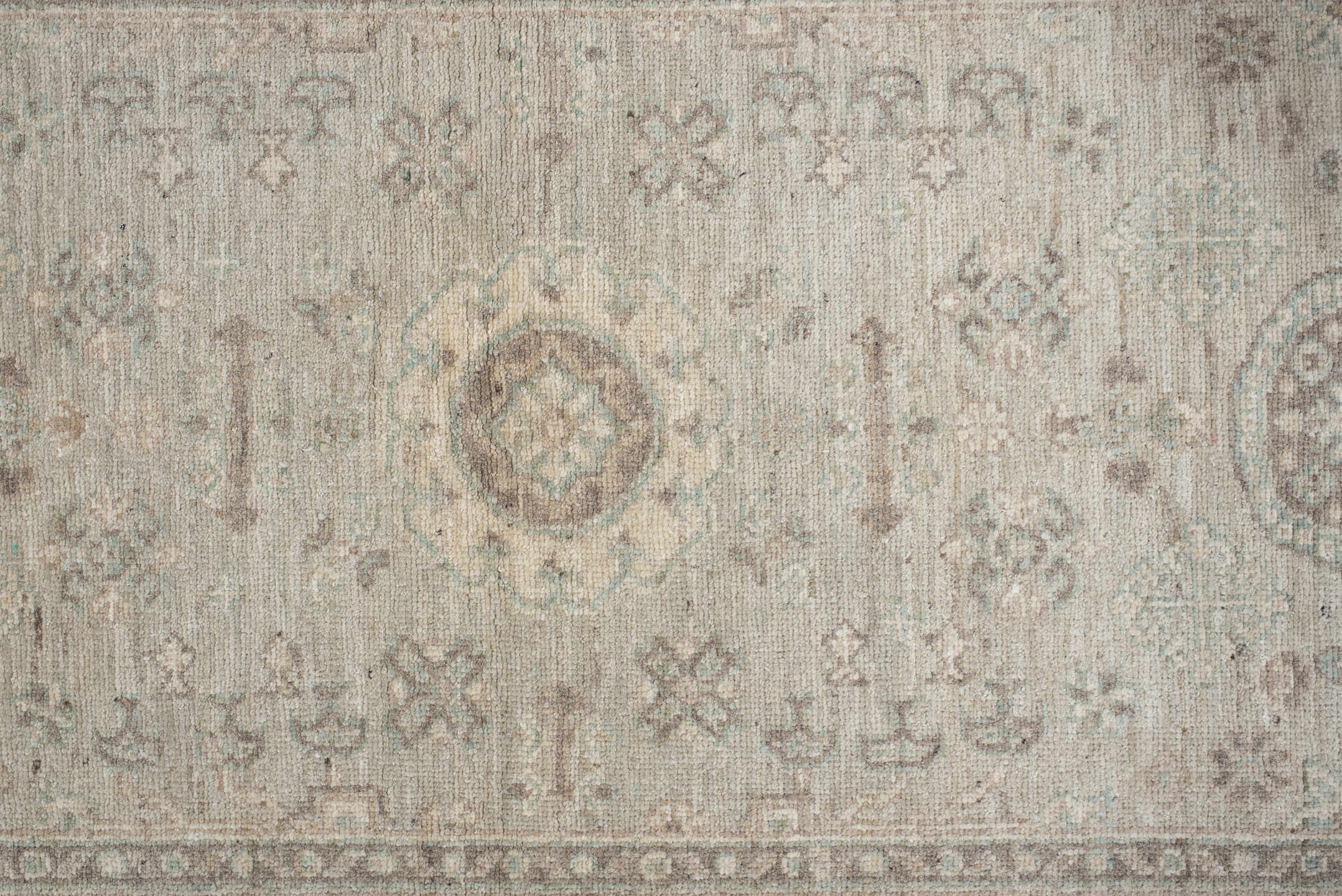 2' x 9' one-of-a-kind handmade vintage Oushak runner rug. Color palette: brown, gray, light gray, off-white, pink
