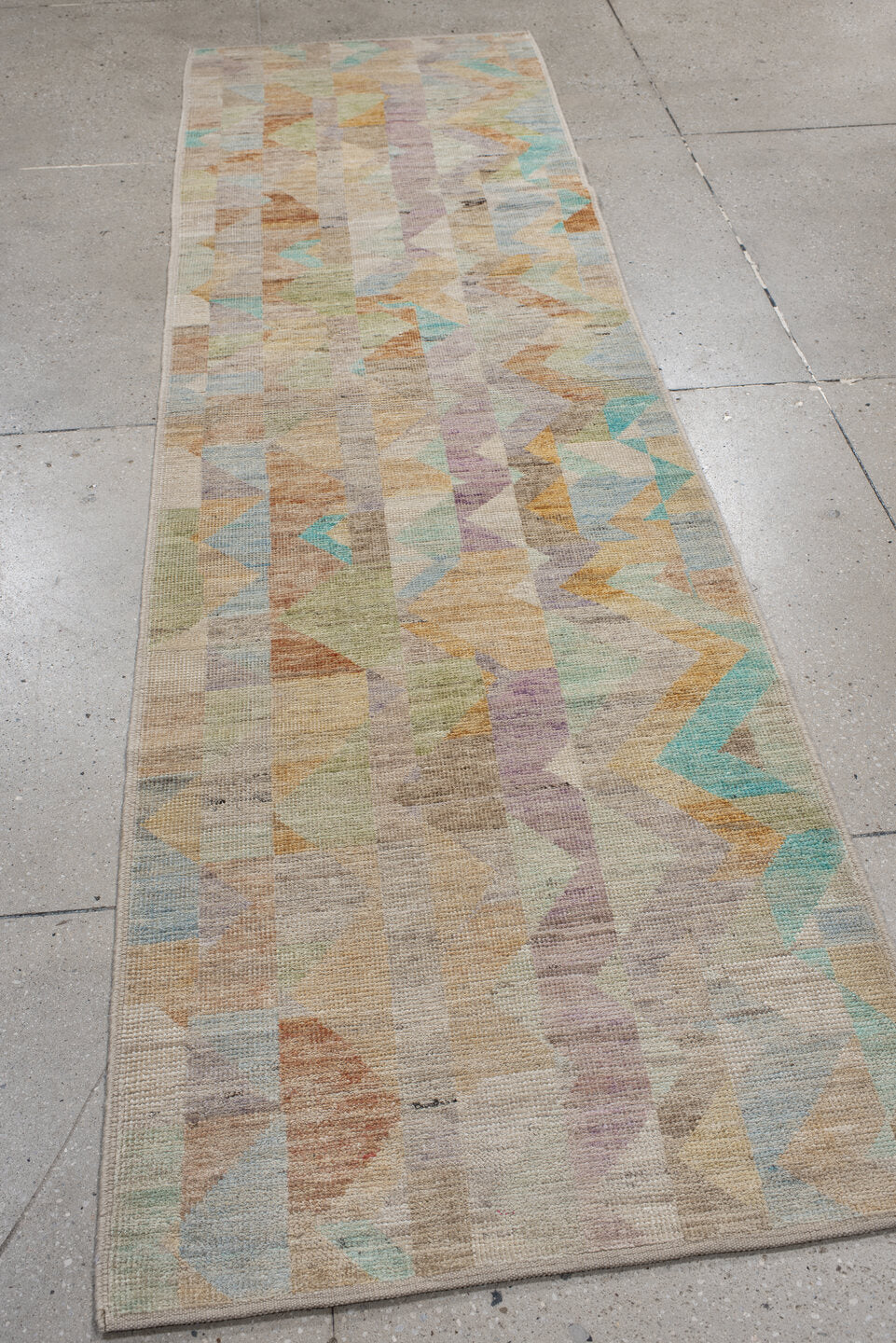 2' x 9' one-of-a-kind handmade vintage Kilim runner rug. Color palette: ivory, beige, aqua, pale blue, lavender, sage, peach