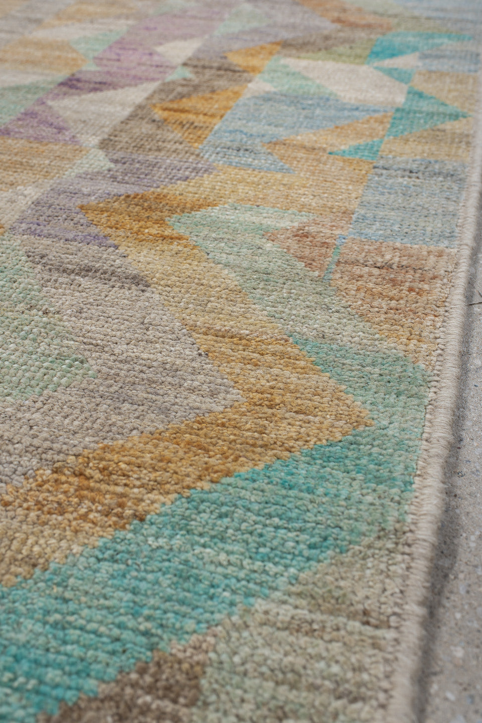 2' x 9' one-of-a-kind handmade vintage Kilim runner rug. Color palette: ivory, beige, aqua, pale blue, lavender, sage, peach