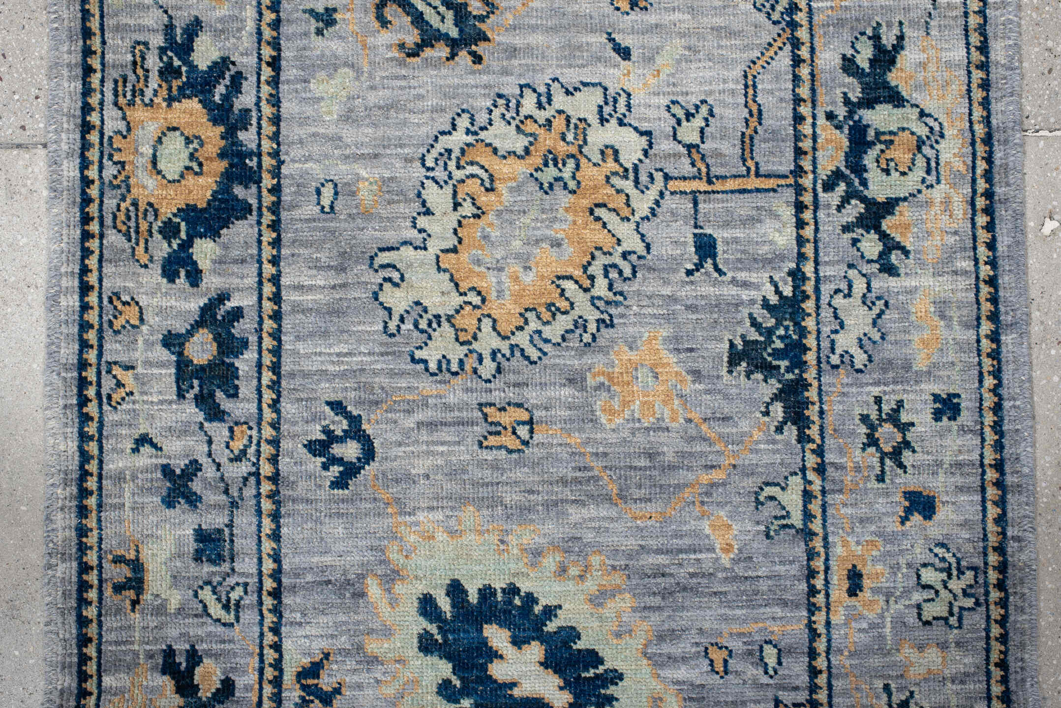 3' x 9' one-of-a-kind handmade vintage Oushak runner rug. Color palette: light blue, navy, ivory, gold, slate, cream, blue