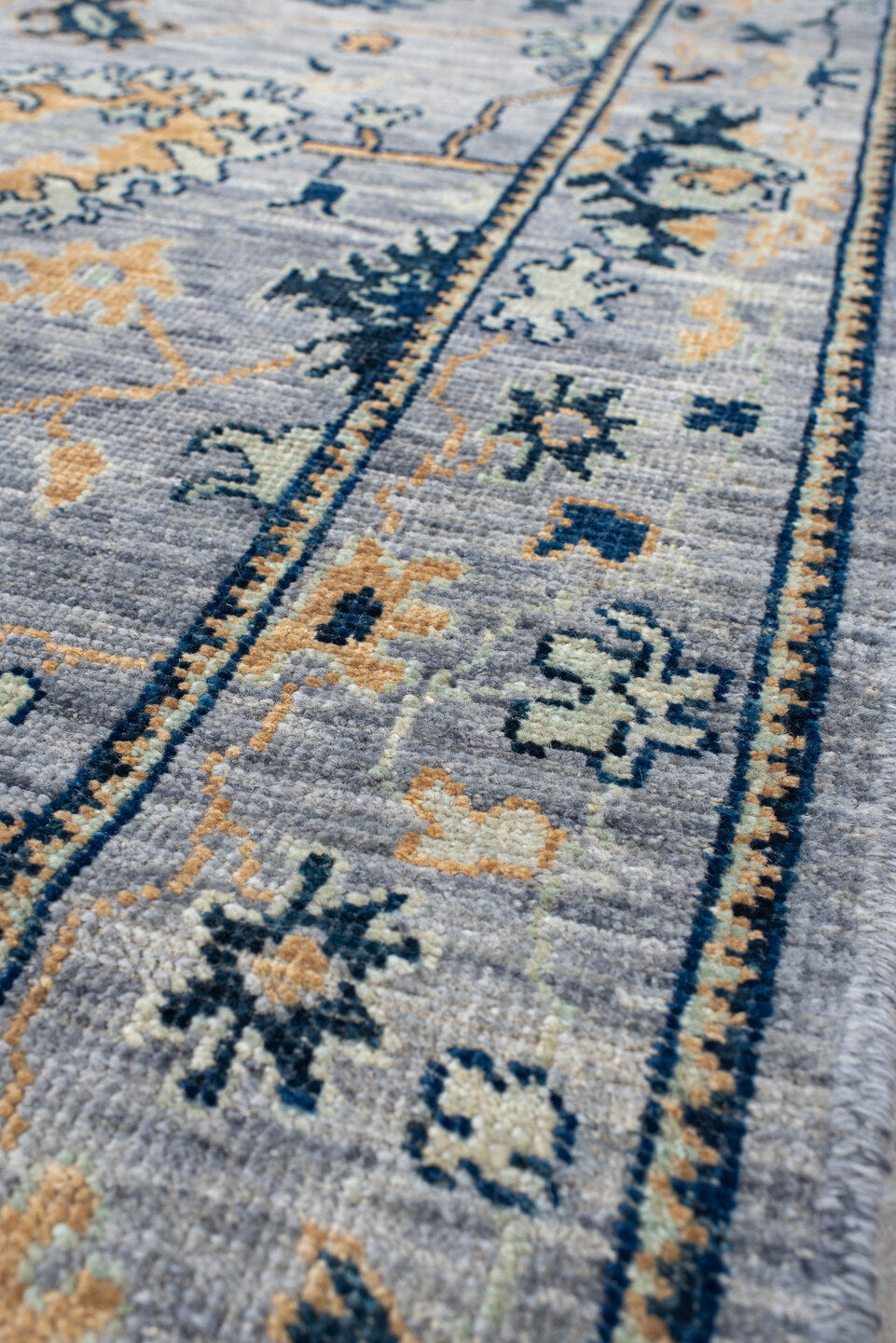 3' x 9' one-of-a-kind handmade vintage Oushak runner rug. Color palette: light blue, navy, ivory, gold, slate, cream, blue