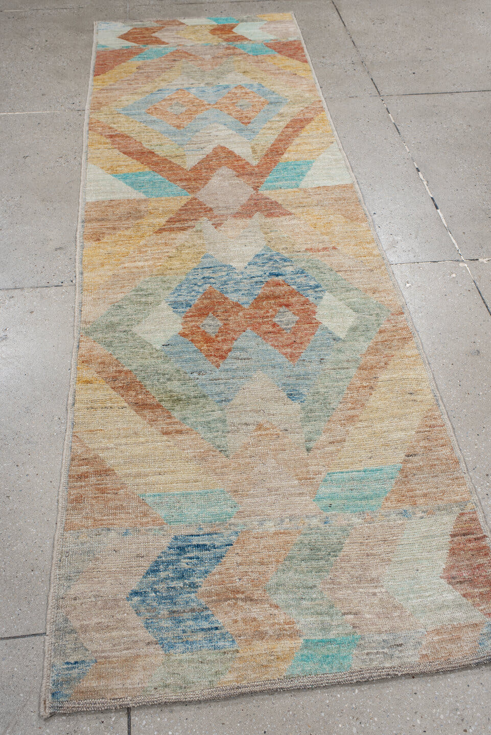 2' x 9' one-of-a-kind handmade vintage Kilim runner rug. Color palette: ivory, aqua, coral, sand, pale blue, sage, taupe