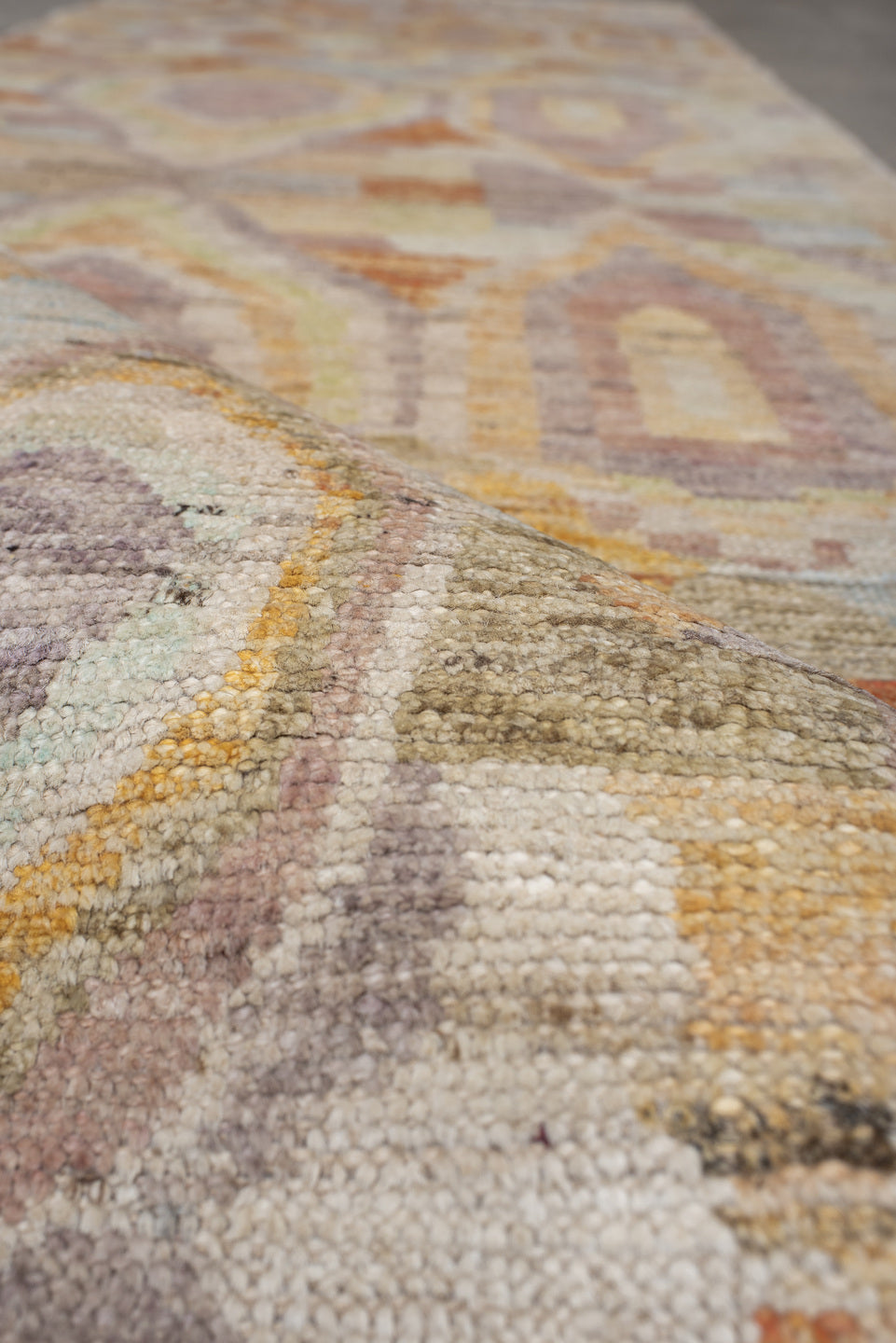 2' x 9' one-of-a-kind handmade vintage Kilim runner rug. Color palette: ivory, lavender, apricot, pale blue, beige, sage