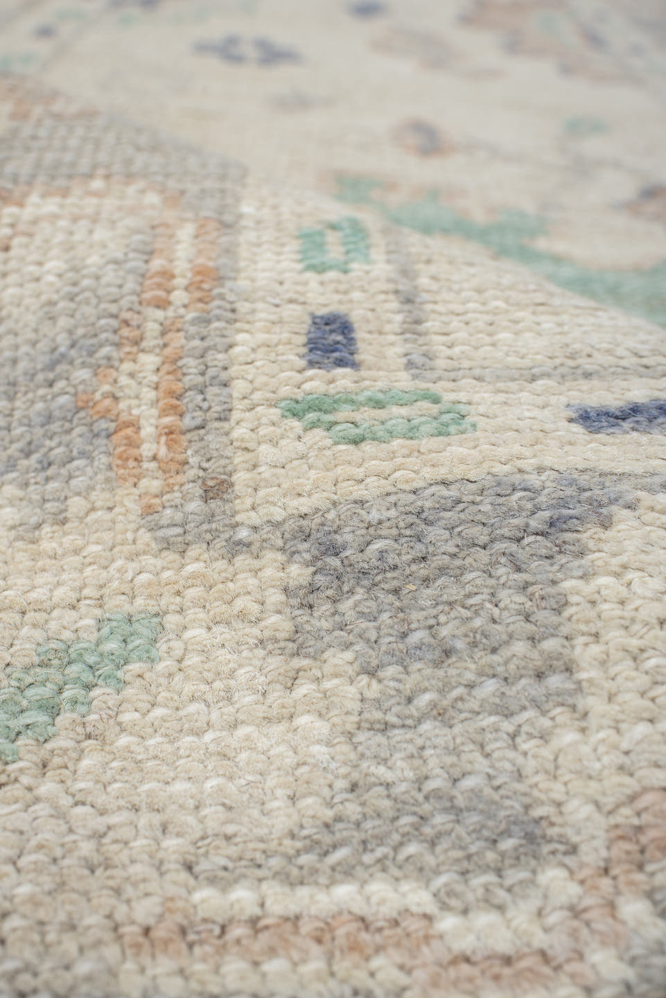 2' x 10' one-of-a-kind handmade vintage Oushak runner rug. Color palette: ivory, light gray, aqua, blue, beige, peach, teal