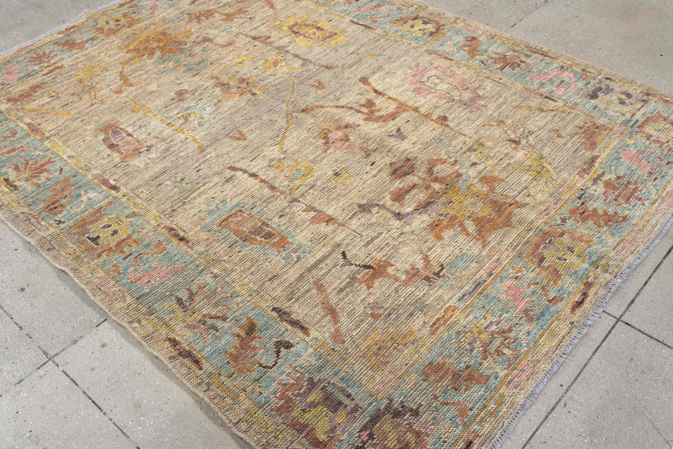 5' x 7' one-of-a-kind handmade vintage Oushak rug. Color palette: beige, aqua, terra cotta, ivory, sage, gold, rose
