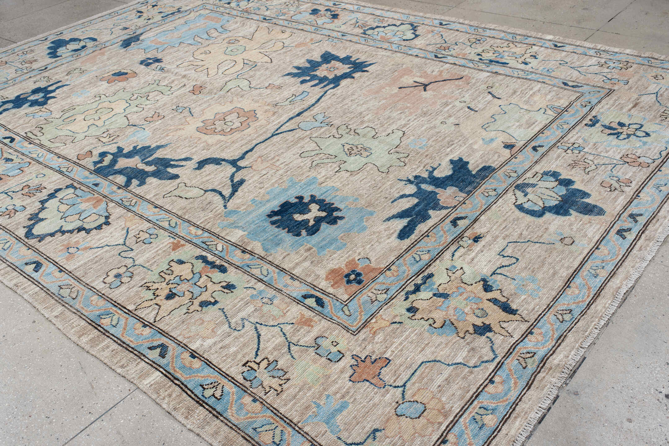 10' x 13' one-of-a-kind handmade vintage Oushak large size rug. Color palette: ivory, sky blue, navy, blush, sage, taupe