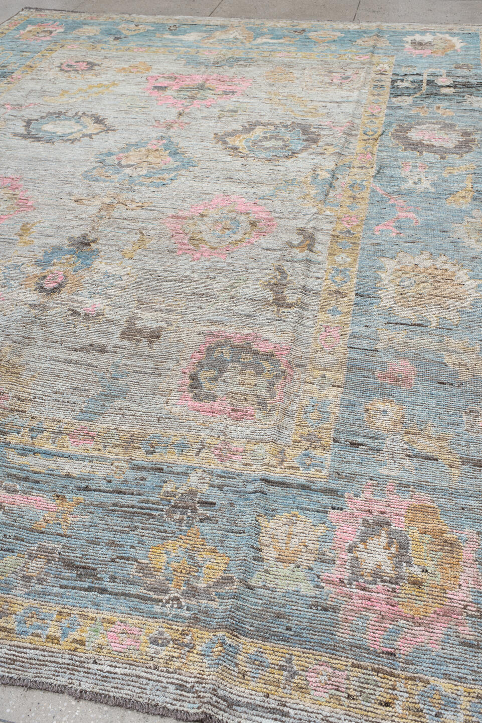 10' x 13' one-of-a-kind handmade vintage Oushak large size rug. Color palette: ivory, pale blue, blush, taupe, gold